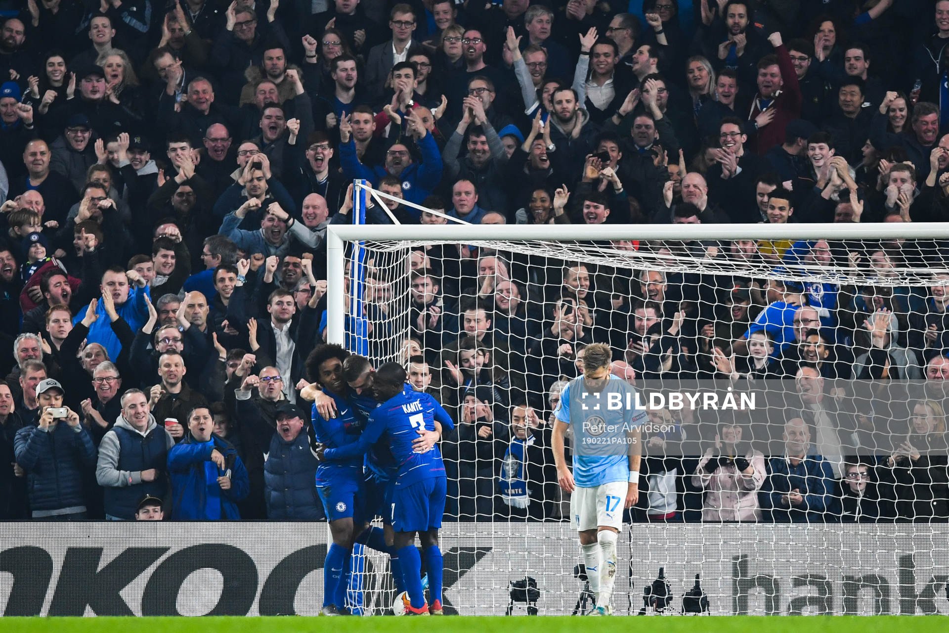 Olivier Giroud celebrates with Willian and N'Golo Kante of