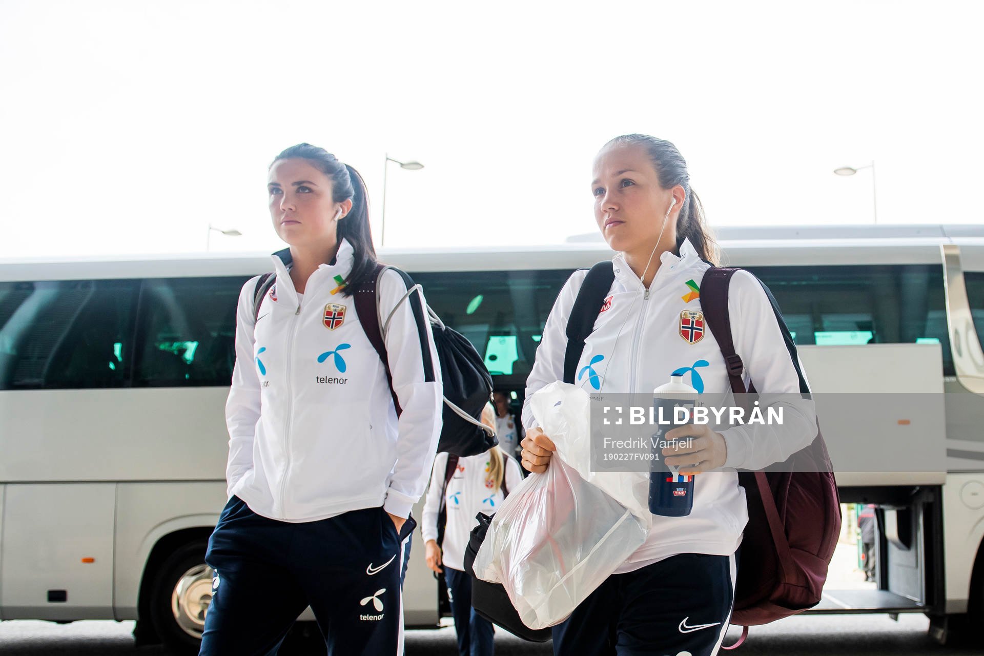 Ingrid Syrstad Engen and Guro Reiten of Norway arrive the