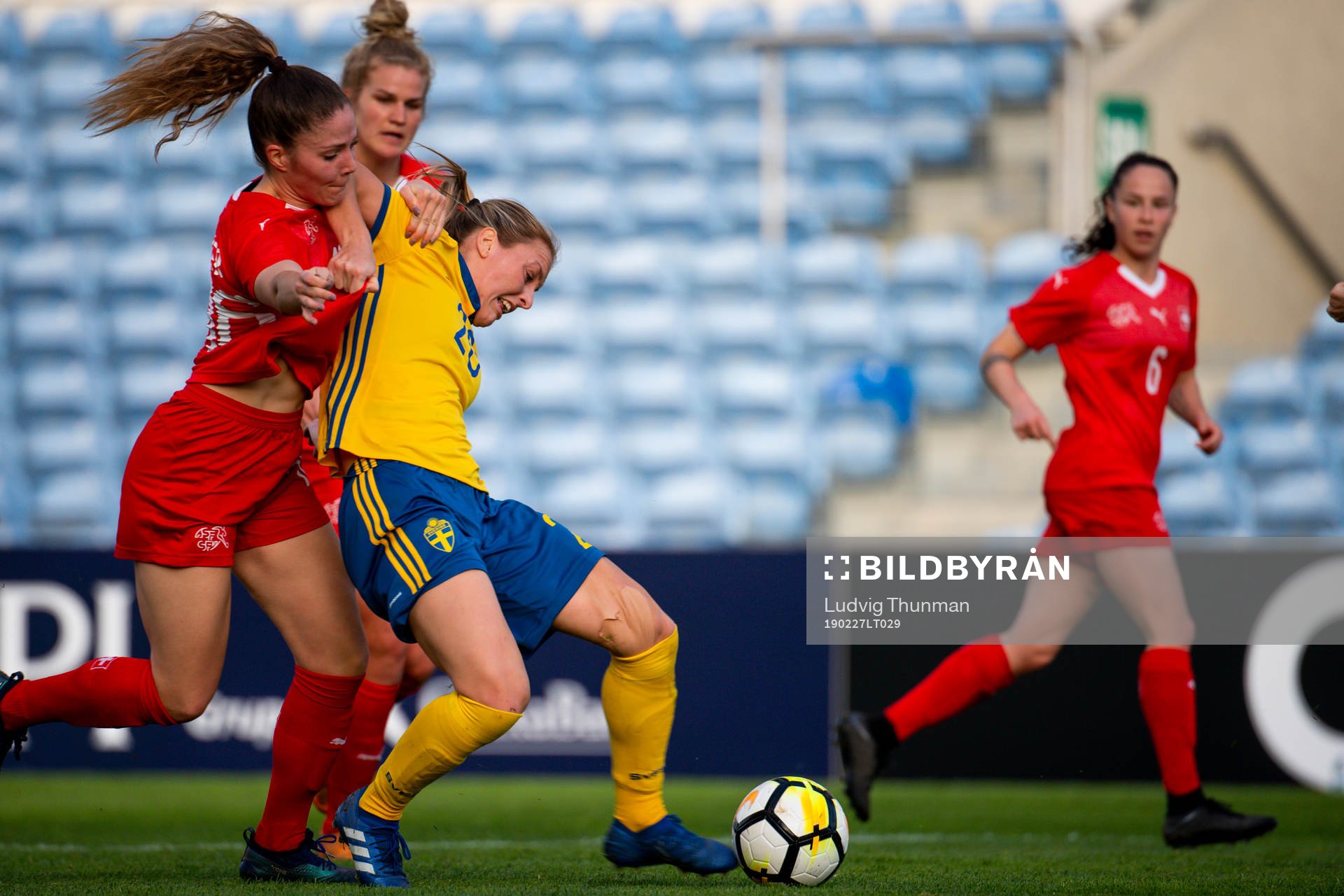 Mimmi Larsson of Sweden fights for the ball with Luana