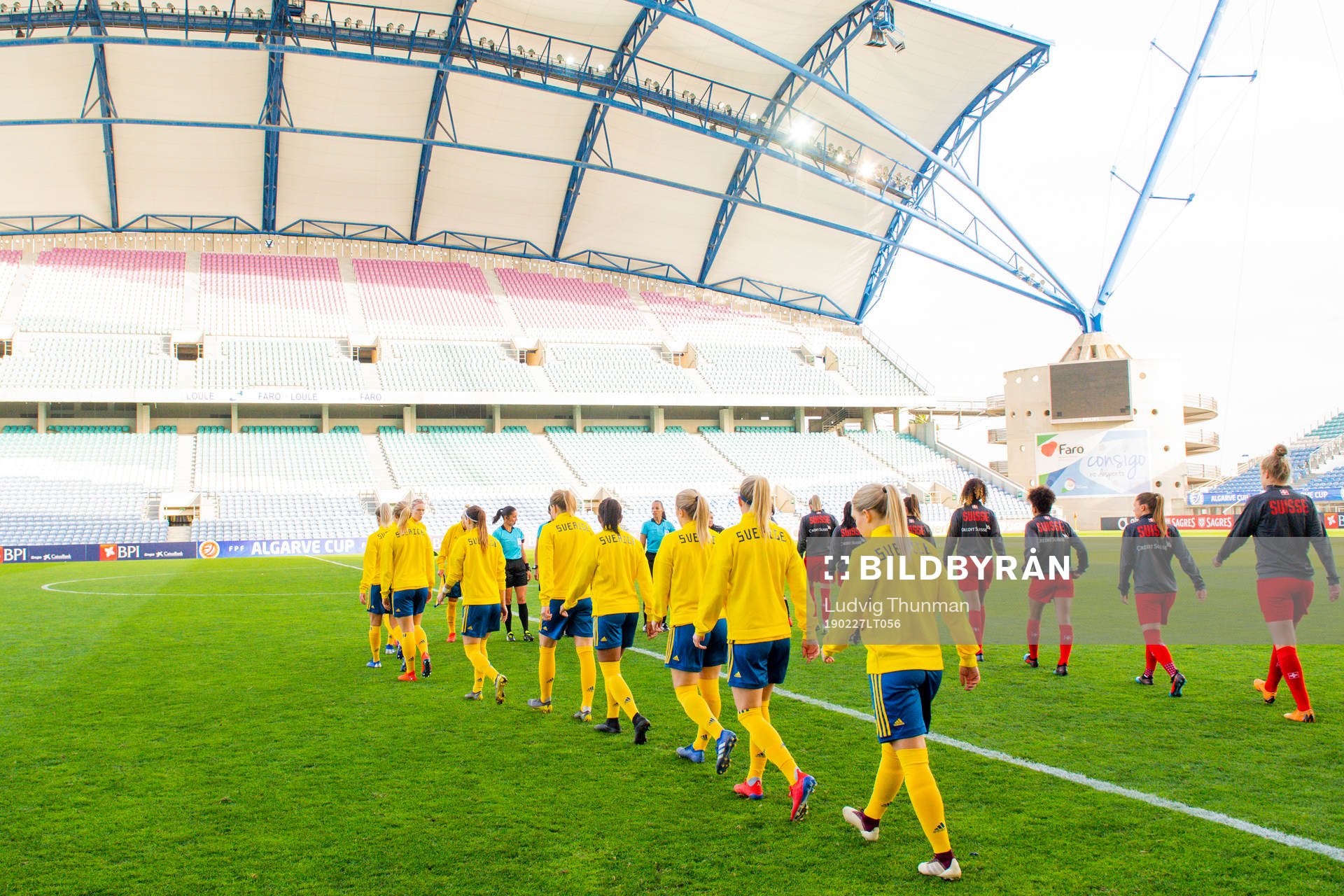 Players enter the pitch