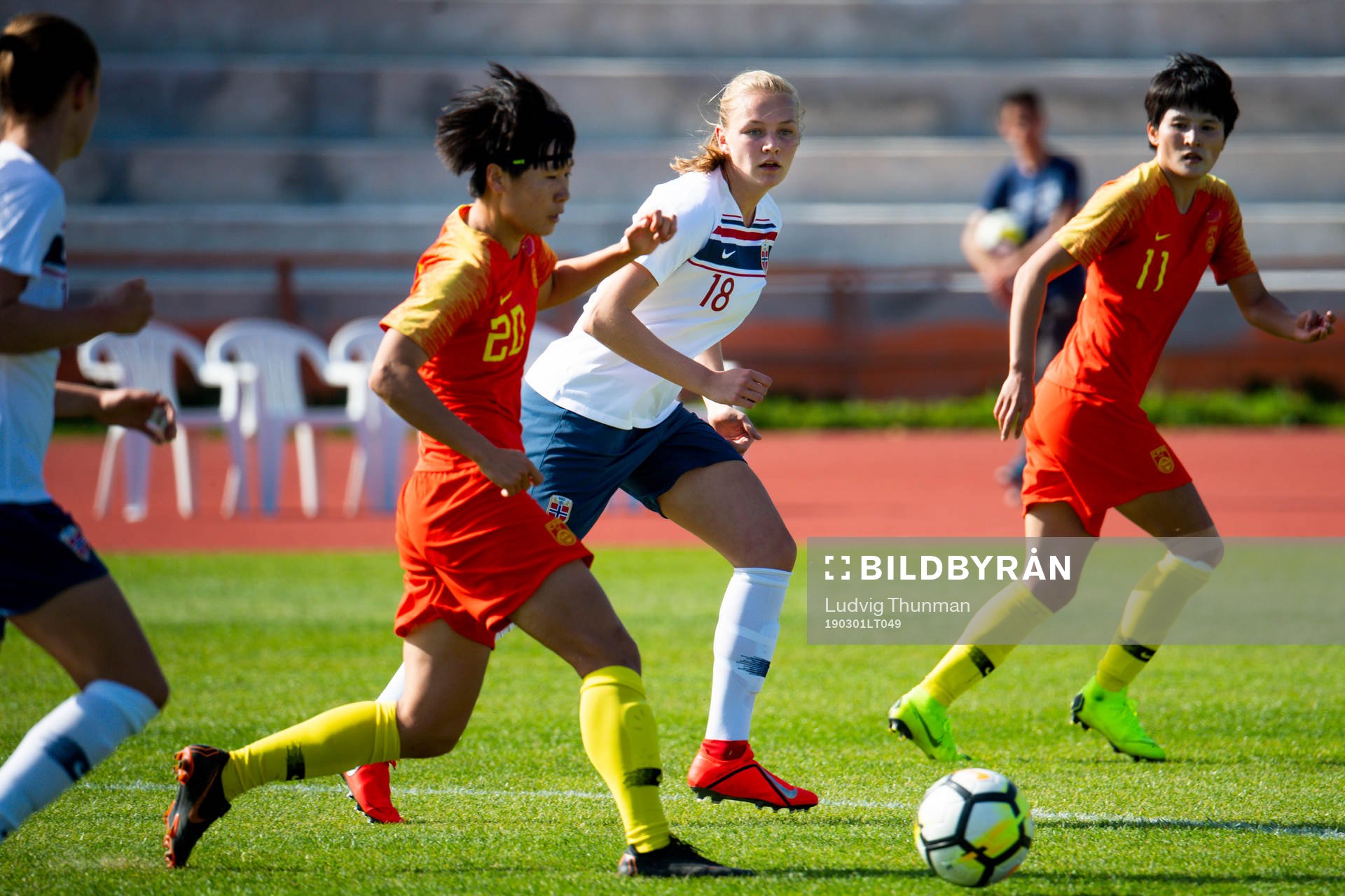 Frida Maanum of Norway watches Zhang Rui of China
