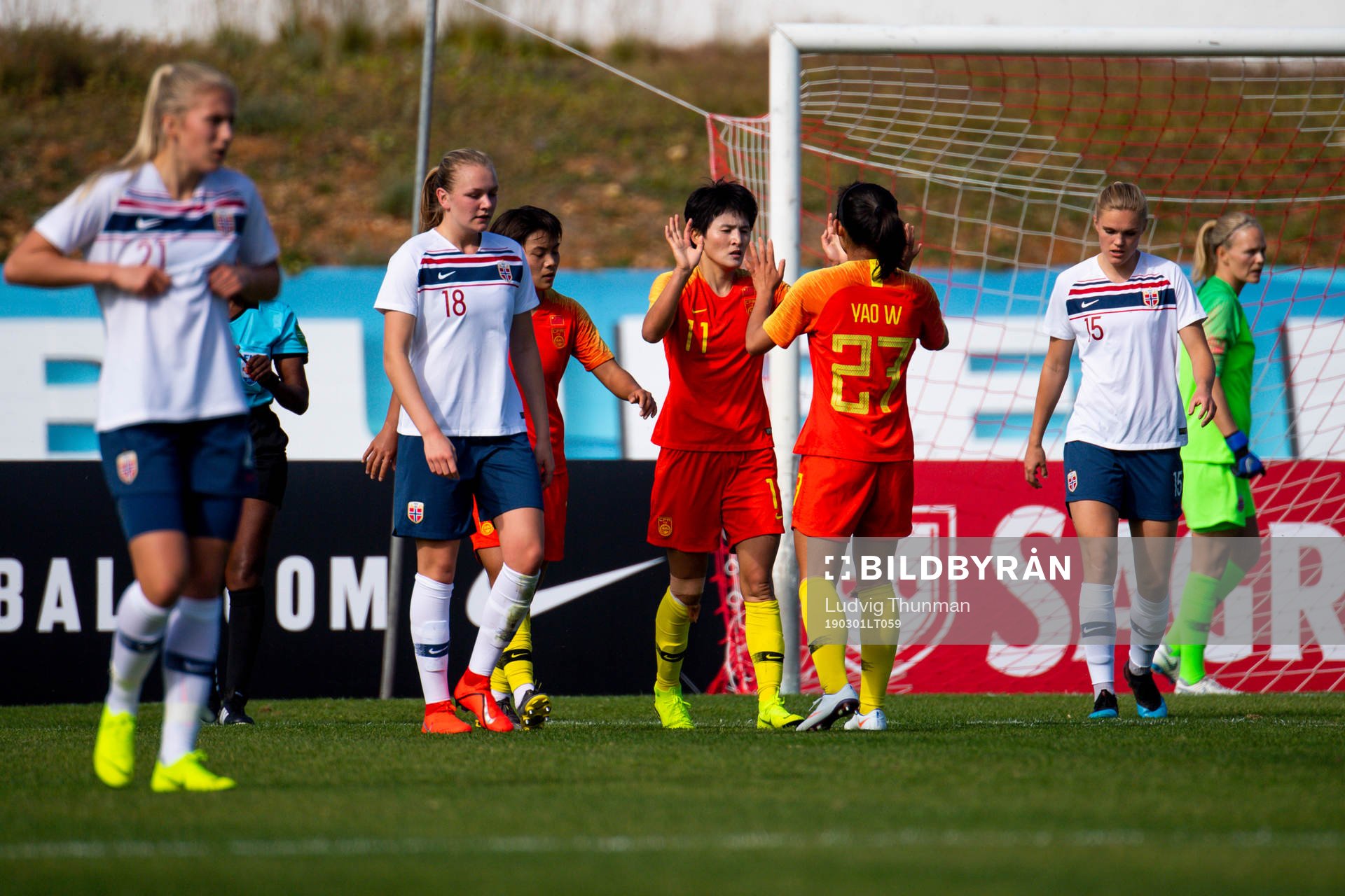 Wang Shanshan of China celebrates with her teammates