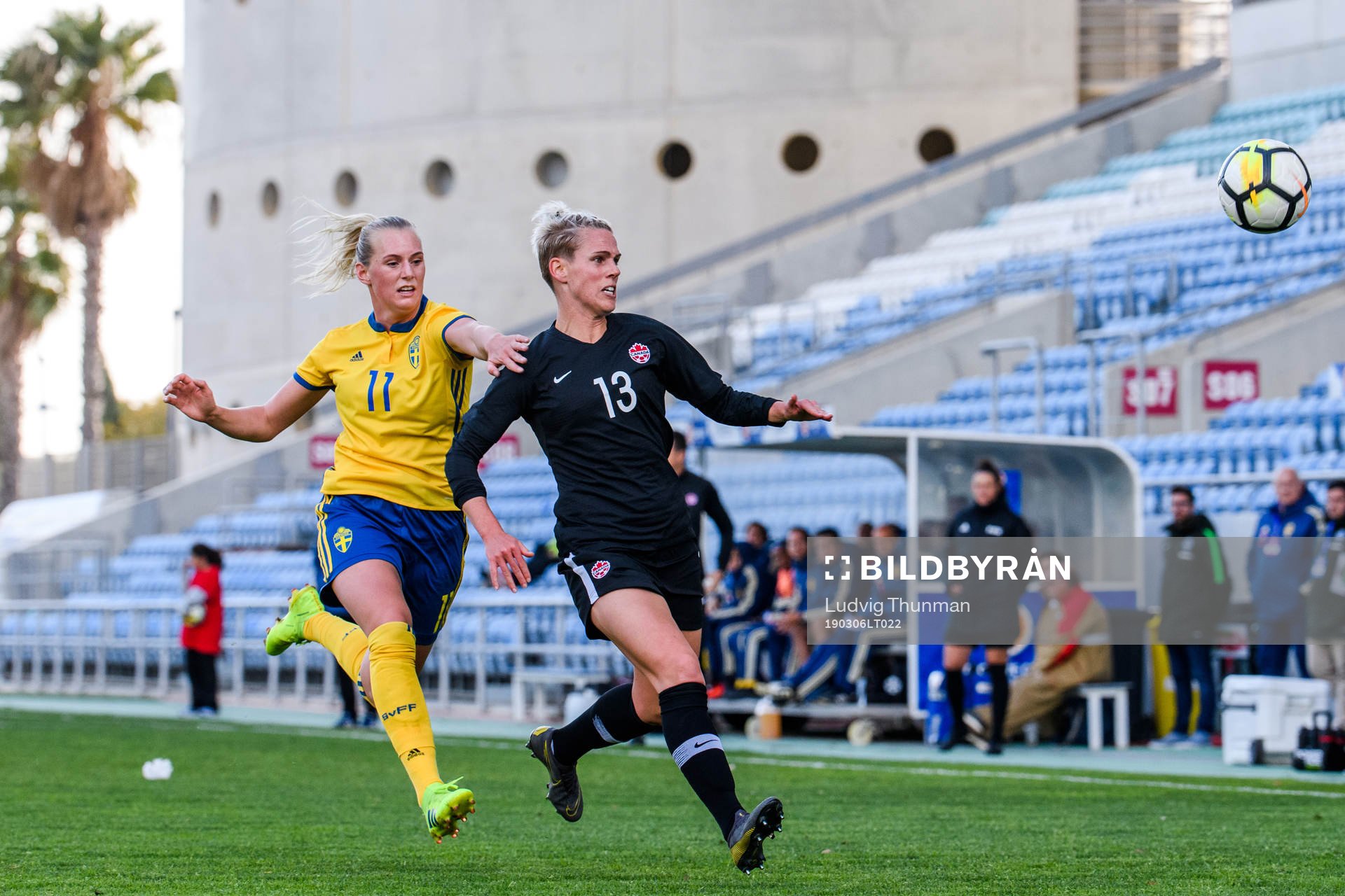 Stina Blackstenius of Sweden and Sophie Schmidt of Canada