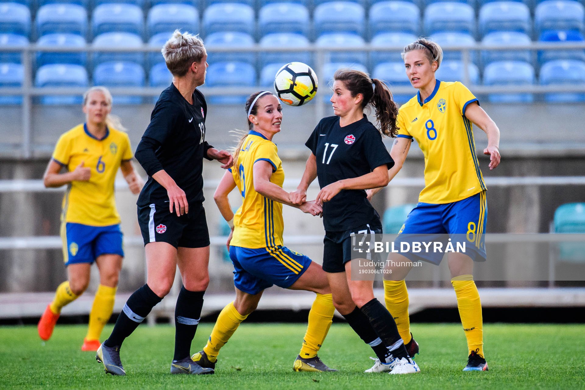 Kosovare Asllani of Sweden and Jessie Fleming of Canada