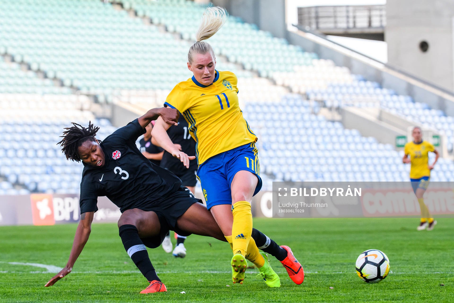 Kadeisha Buchanan of Canada and Stina Blackstenius of Sweden
