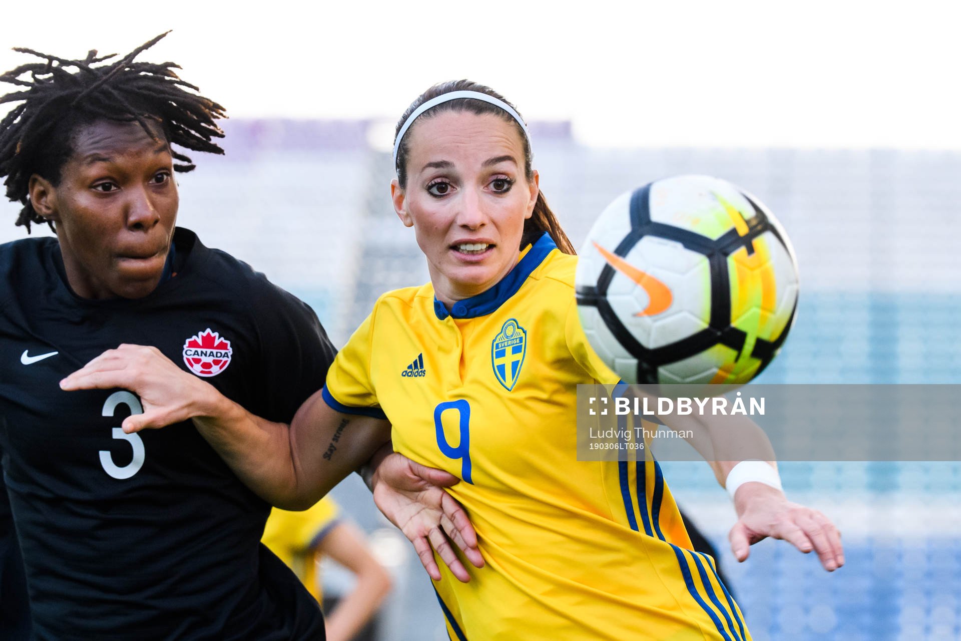 Kadeisha Buchanan of Canada and Kosovare Asllani of Sweden