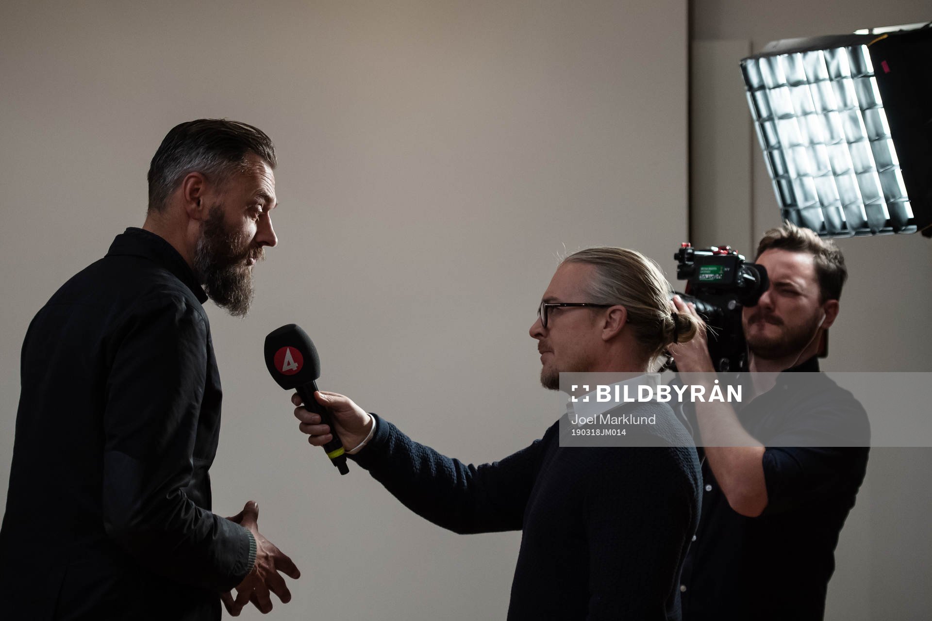 Fotbollskanalen's reporter Olof Lundh is being interviewed by TV4's Mattias Tjernström at a press event on March 18, 2019 in Stockholm.