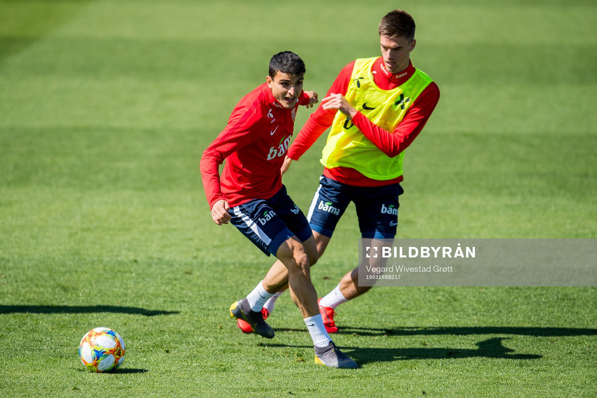 Mohamed Elyounoussi and Markus Henriksen of Norway
