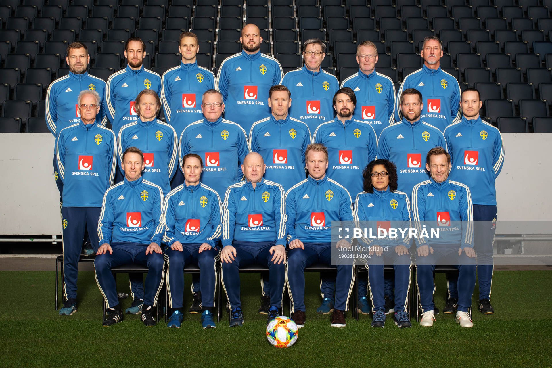 Staff of the Swedish national football team pose for a