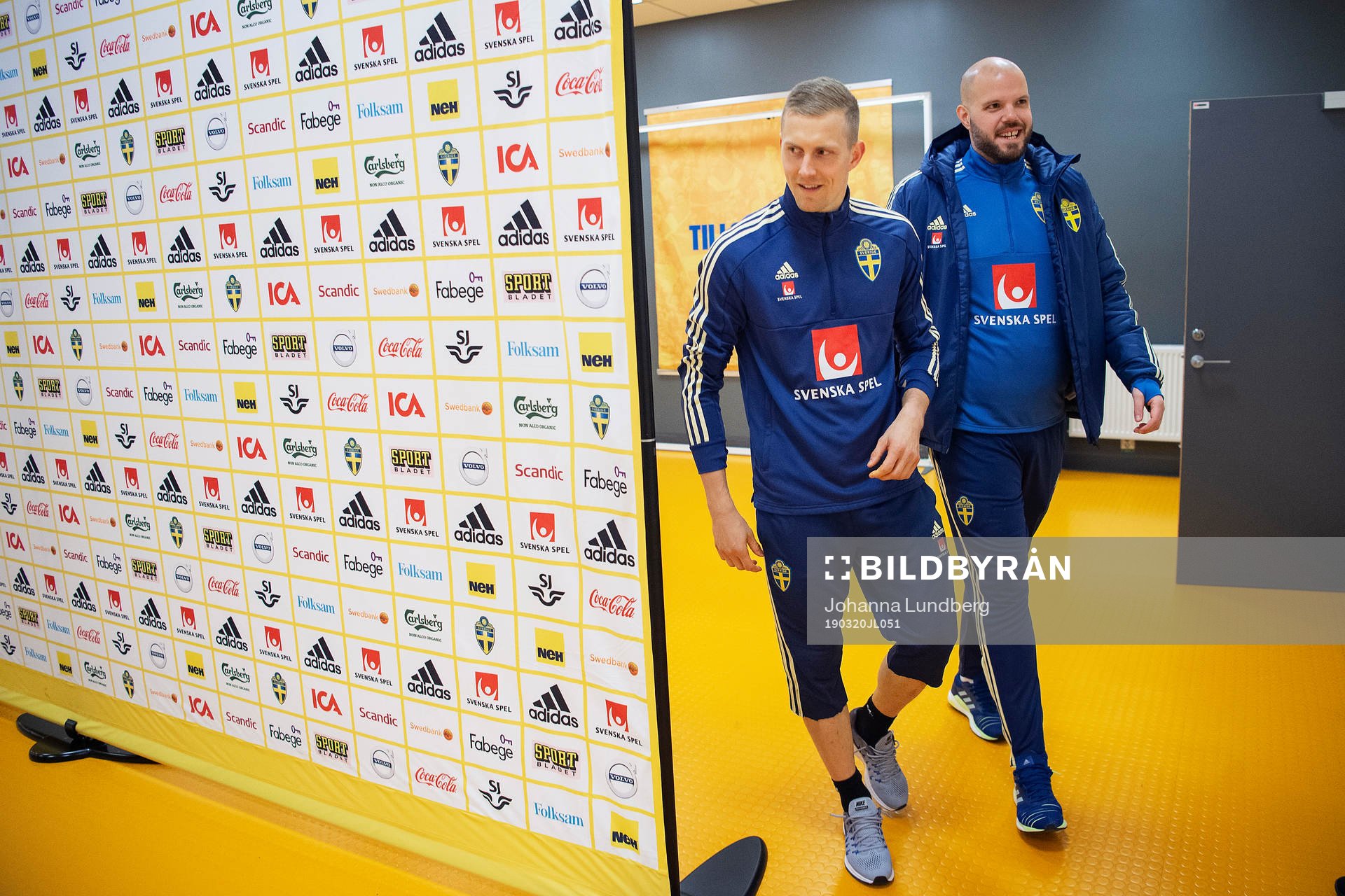 Karl-Johan Johnsson of Sweden and media officer Jakob
