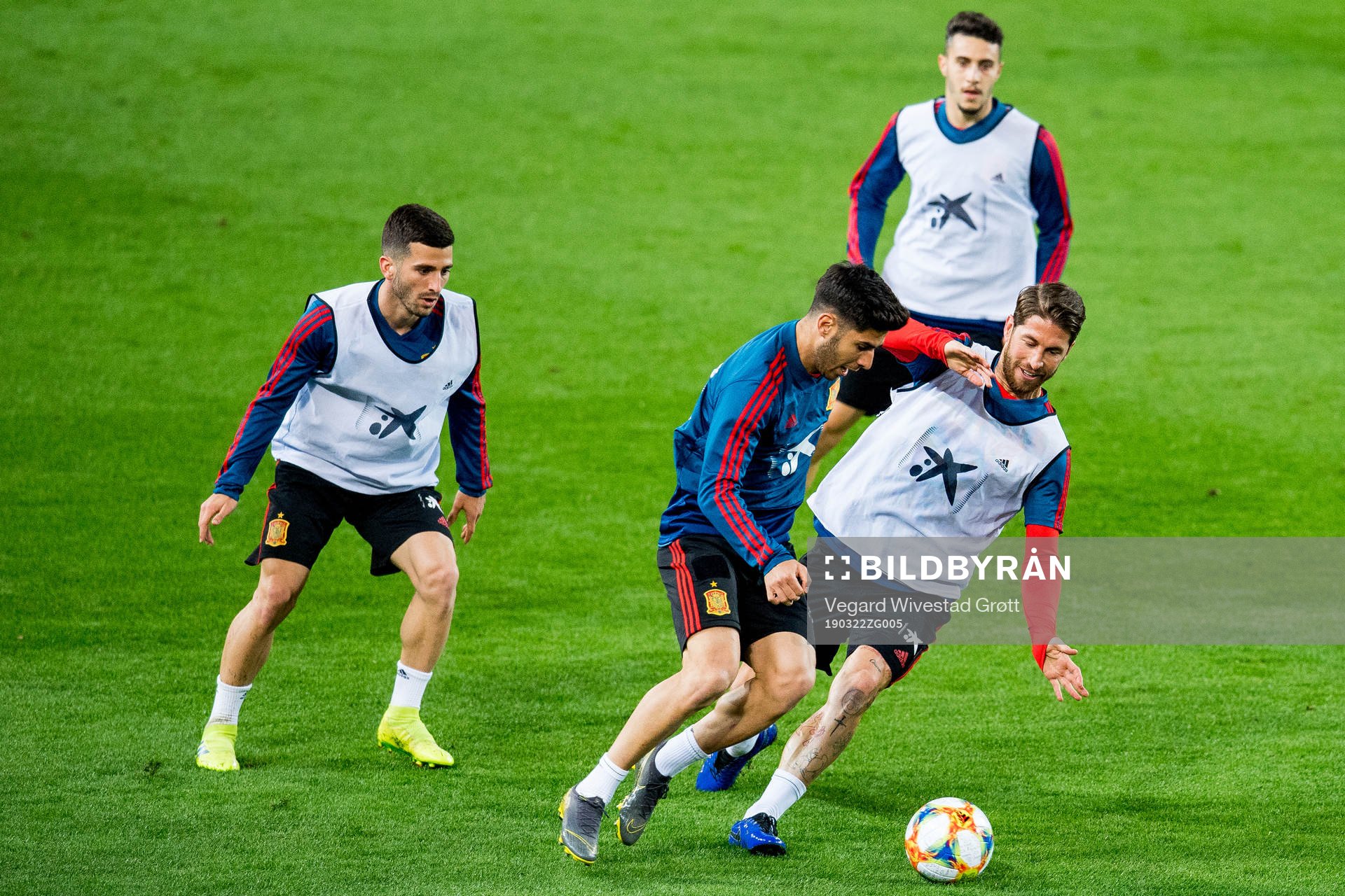 Marco Asensio and Sergio Ramos of Spain