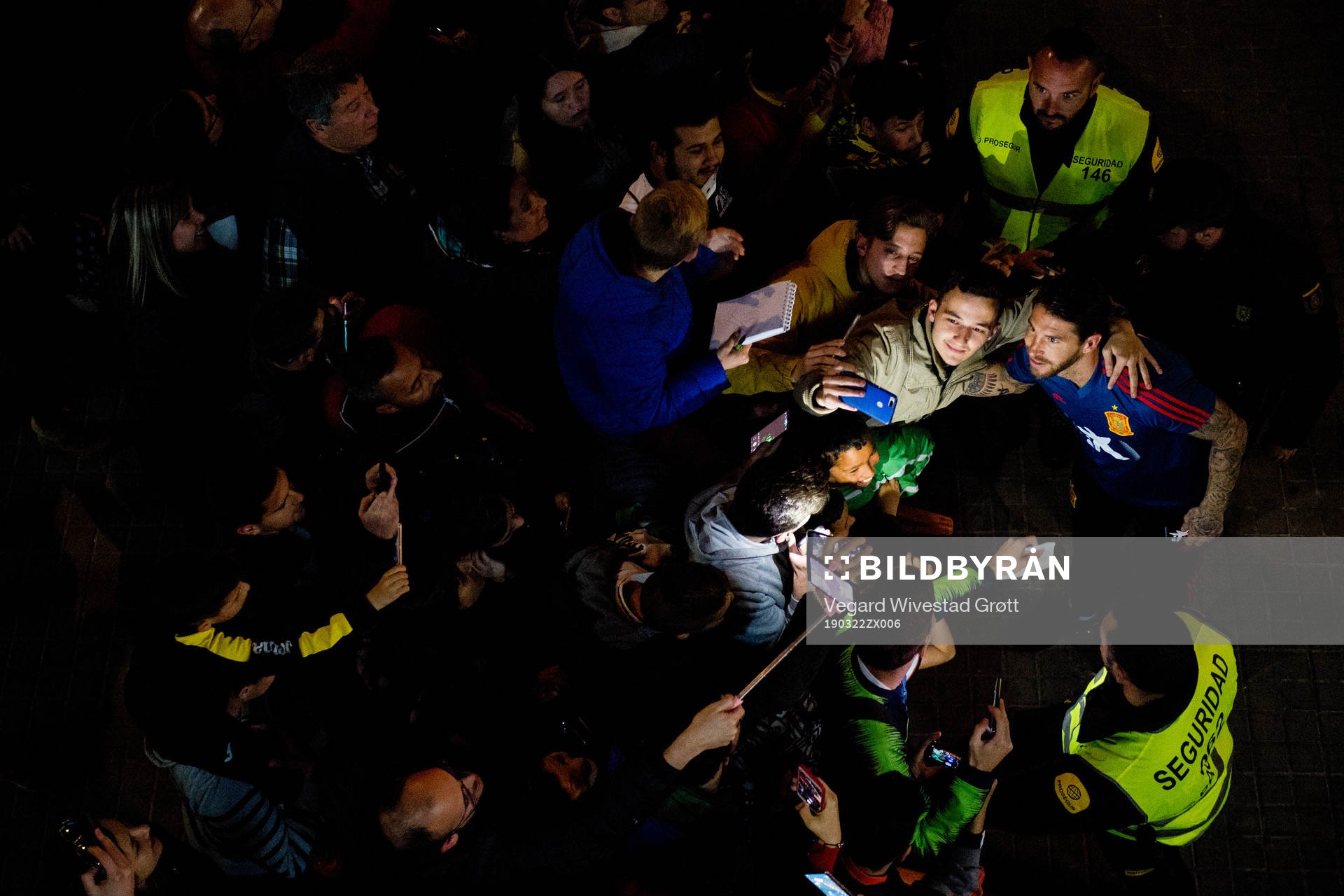 Sergio Ramos of Spain takes pictures with the fans