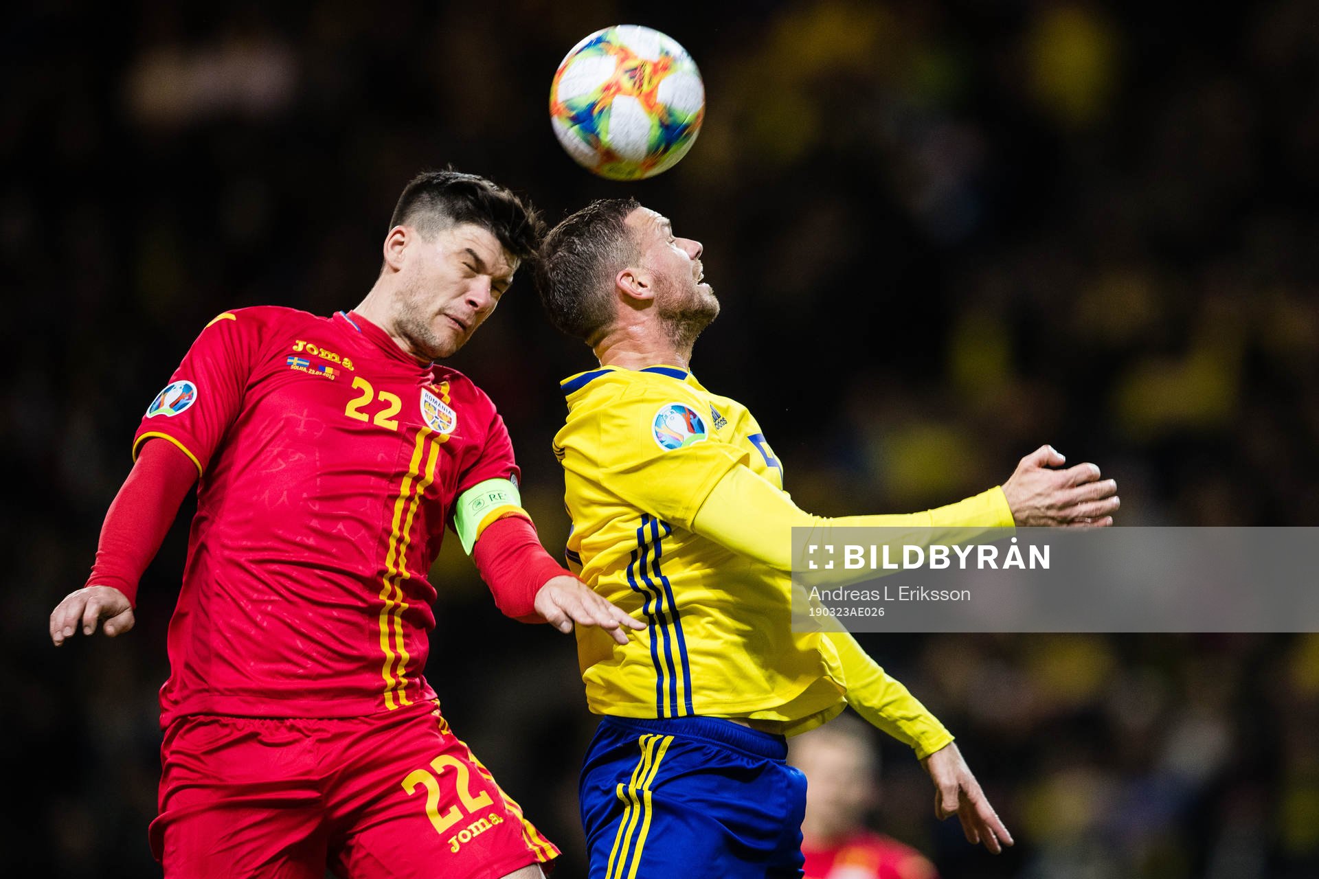 Cristian Sapunaru of Romania nd Marcus Berg of Sweden