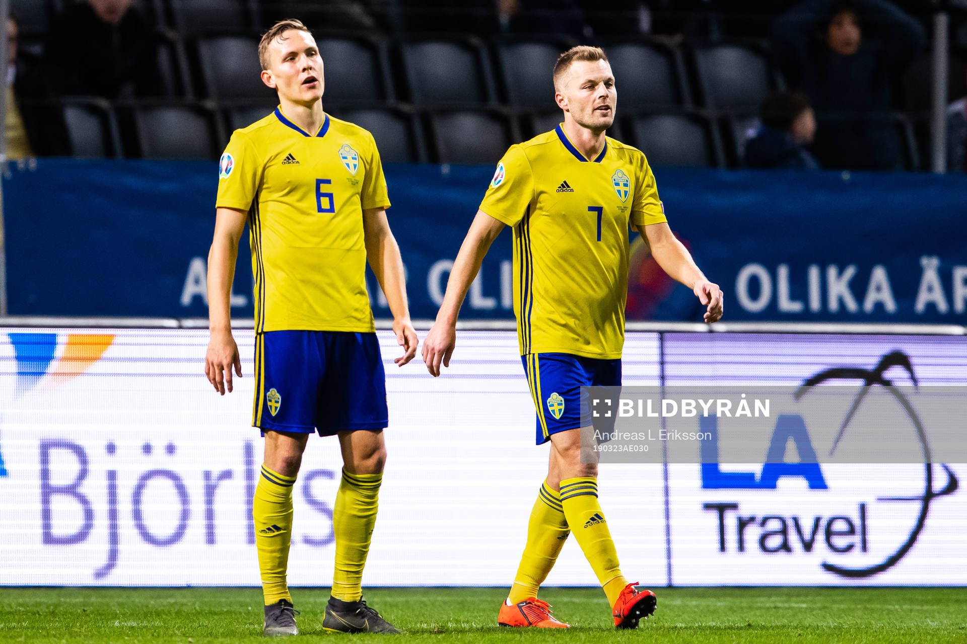 Ludwig Augustinsson and Sebastian Larsson of Sweden look