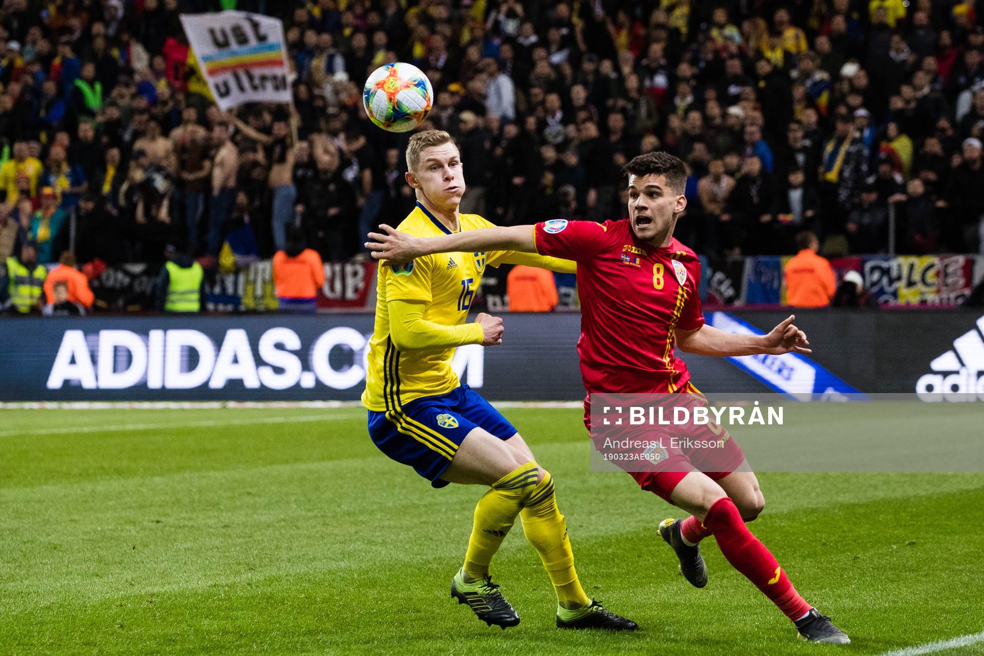 Emil Krafth of Sweden and Ianis Hagi of Romania competes