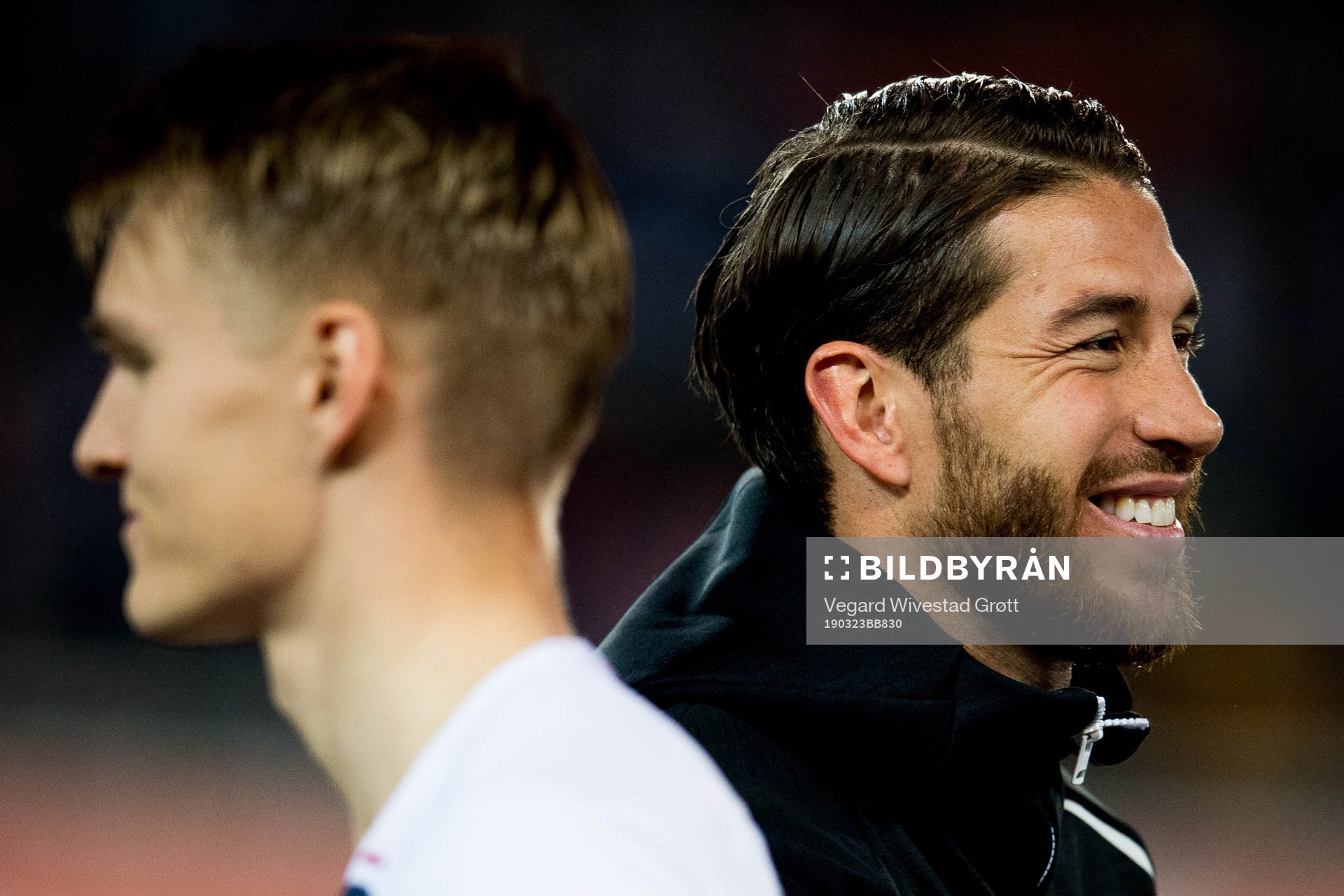 Martin Ødegaard of Norway and Sergio Ramos of Spain