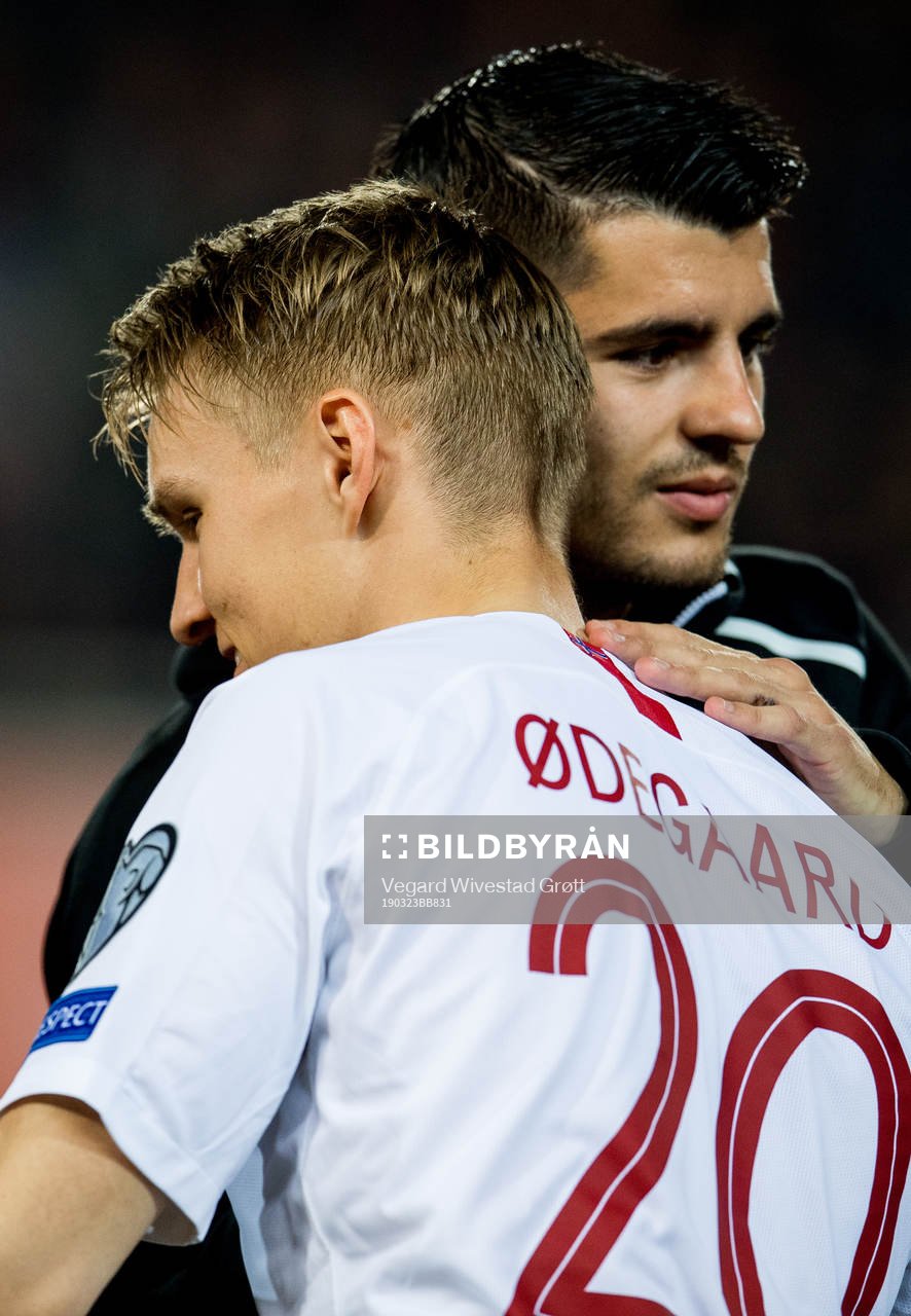 Martin Ødegaard of Norway and Alvaro Morata of Spain