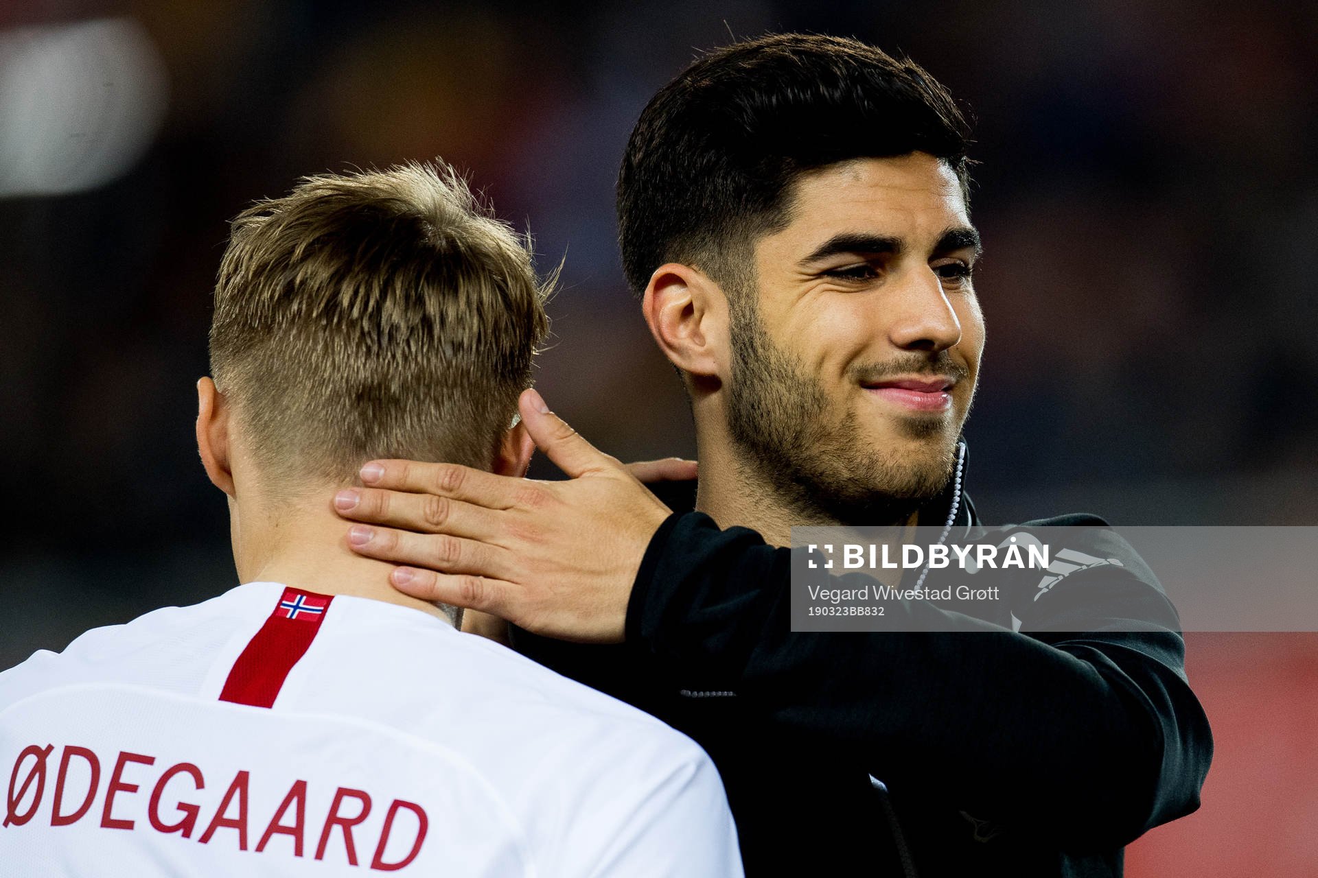 Martin Ødegaard of Norway and Marco Asensio of Spain