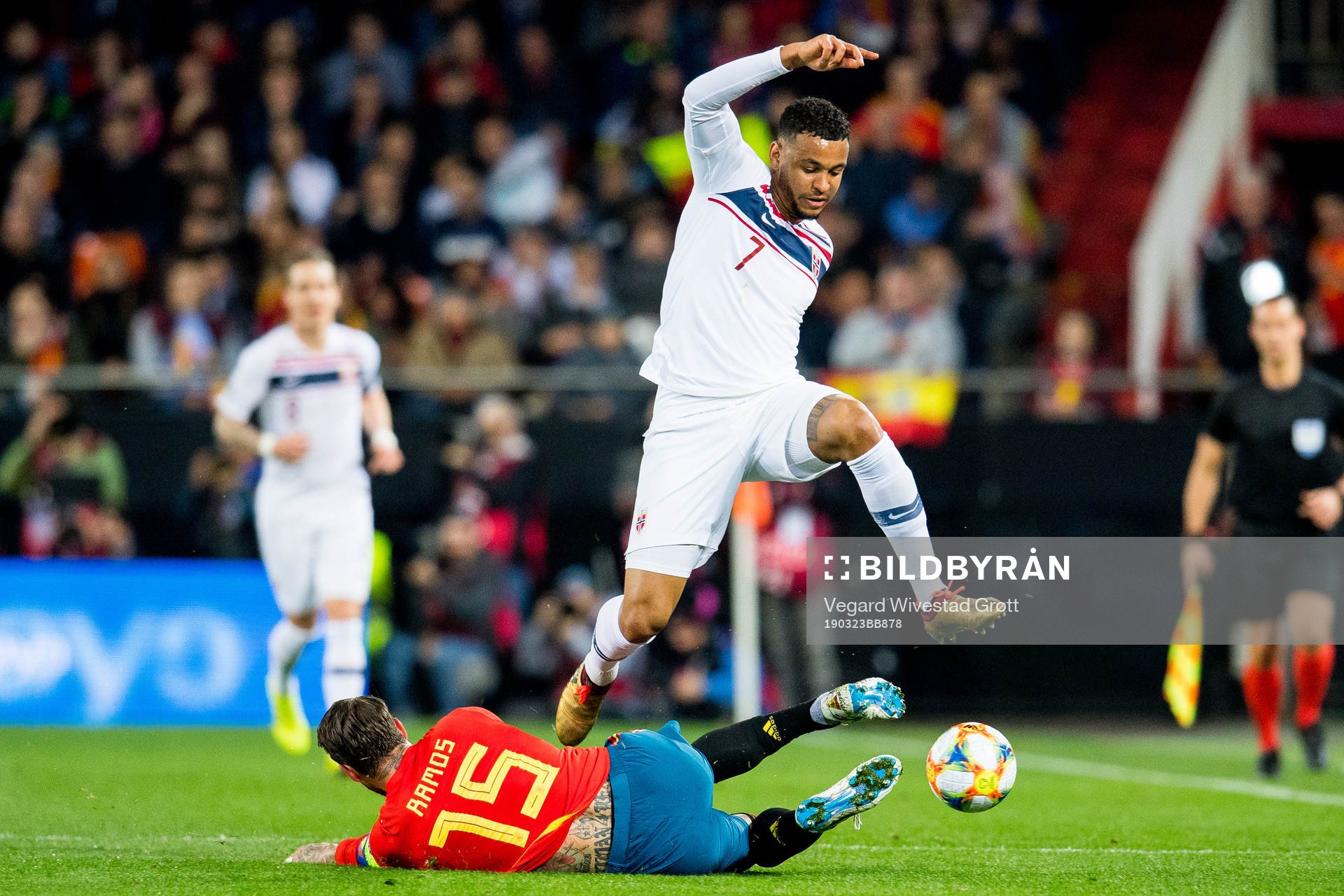 Sergio Ramos of Spain and Joshua King of Norway