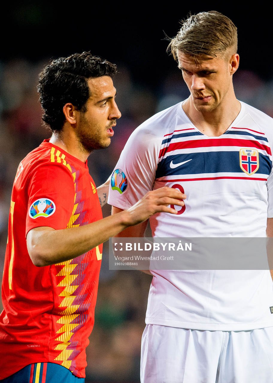 Daniel Parejo Munoz of Spain and Kristoffer Ajer of Norway