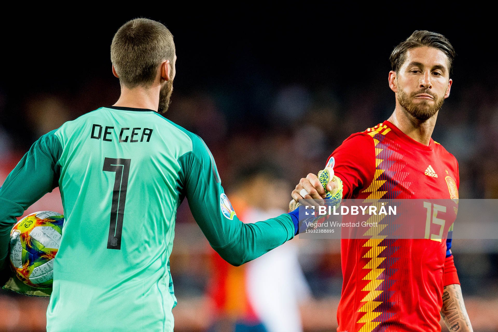 Goalkeeper David de Gea and Sergio Ramos of Spain