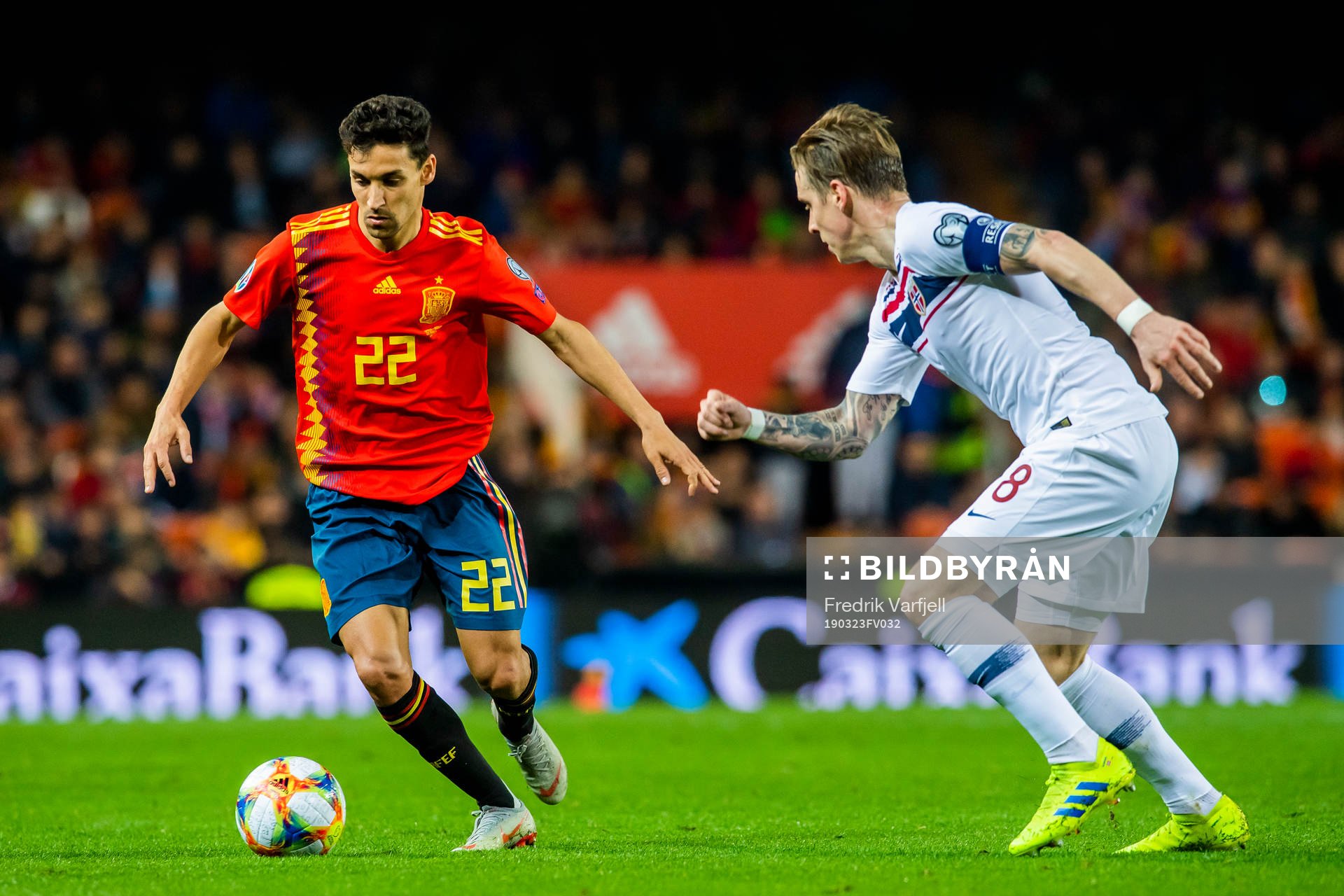 Jesus Navas of Spain and Stefan Johansen