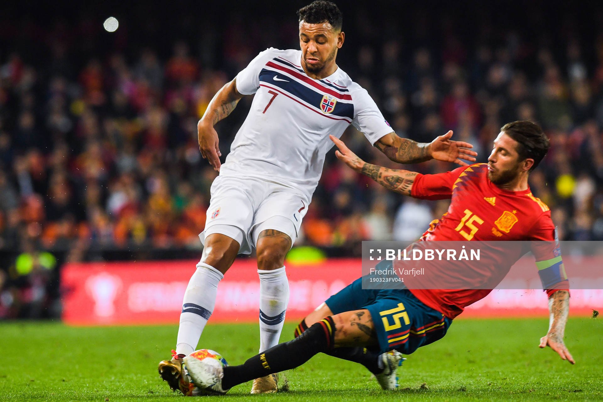 Joshua King of Norway and Sergio Ramos of Spain