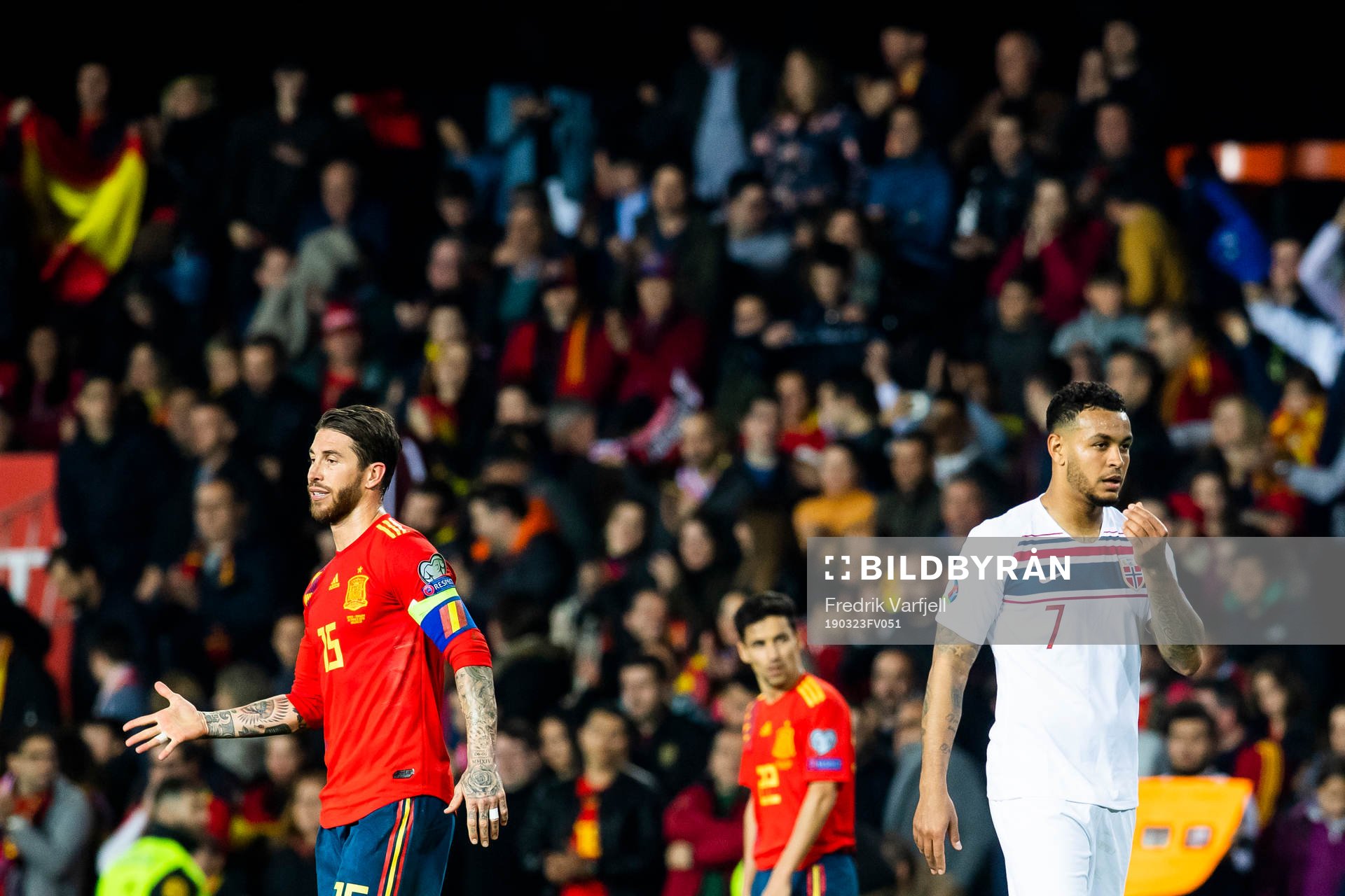 Sergio Ramos of Spain and Joshua King of Norway