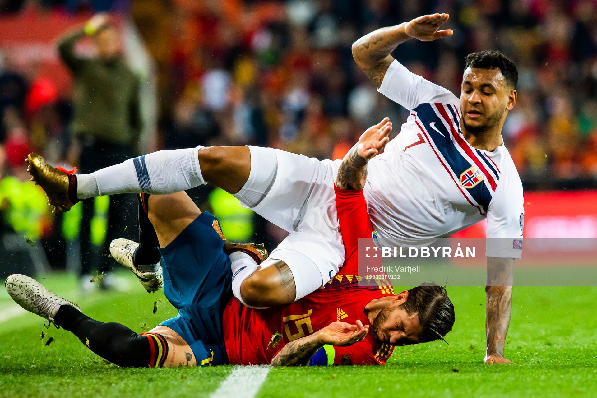 Joshua King of Norway and Sergio Ramos of Spain
