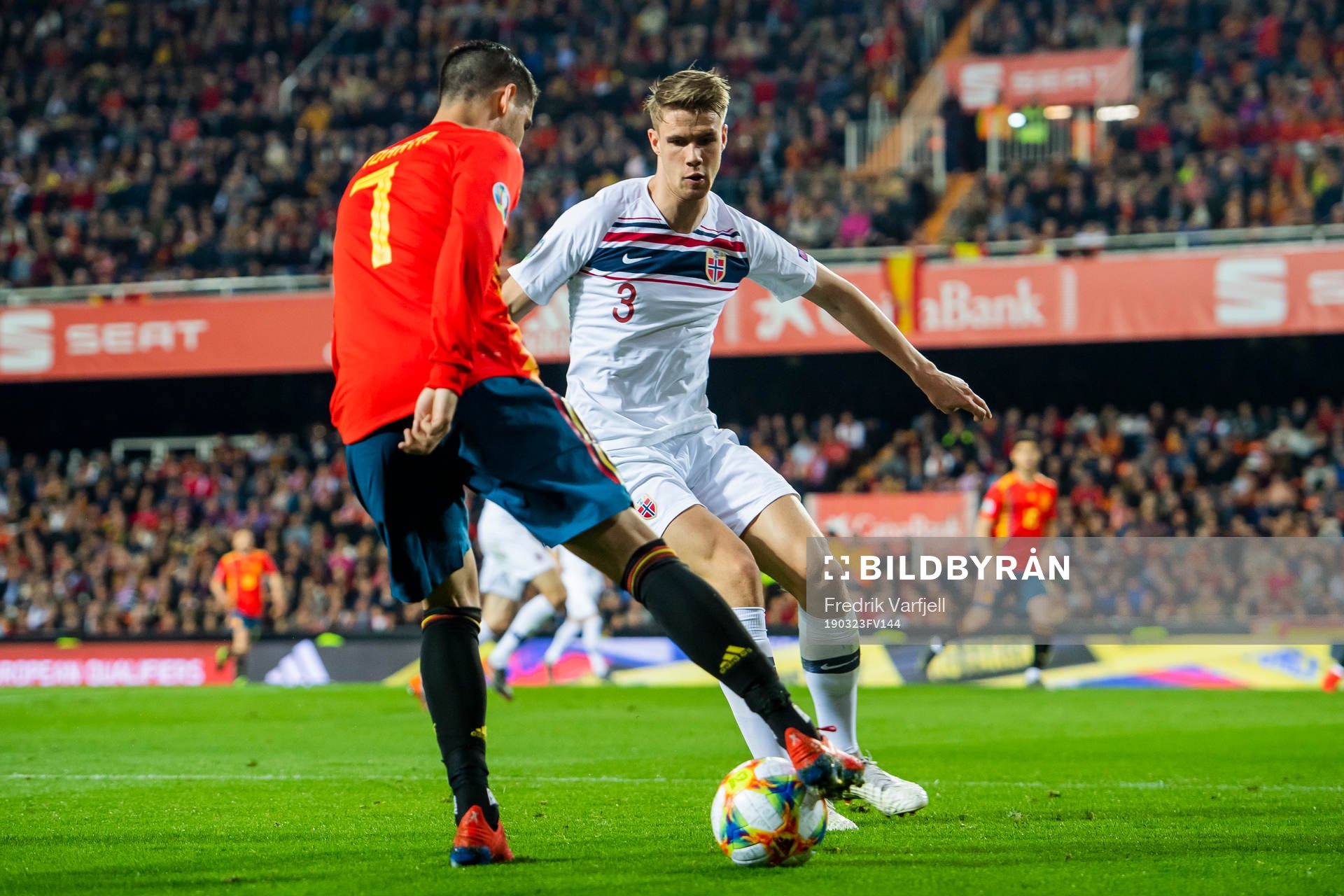 Alvaro Morata of Spain and Kristoffer Ajer of Norway