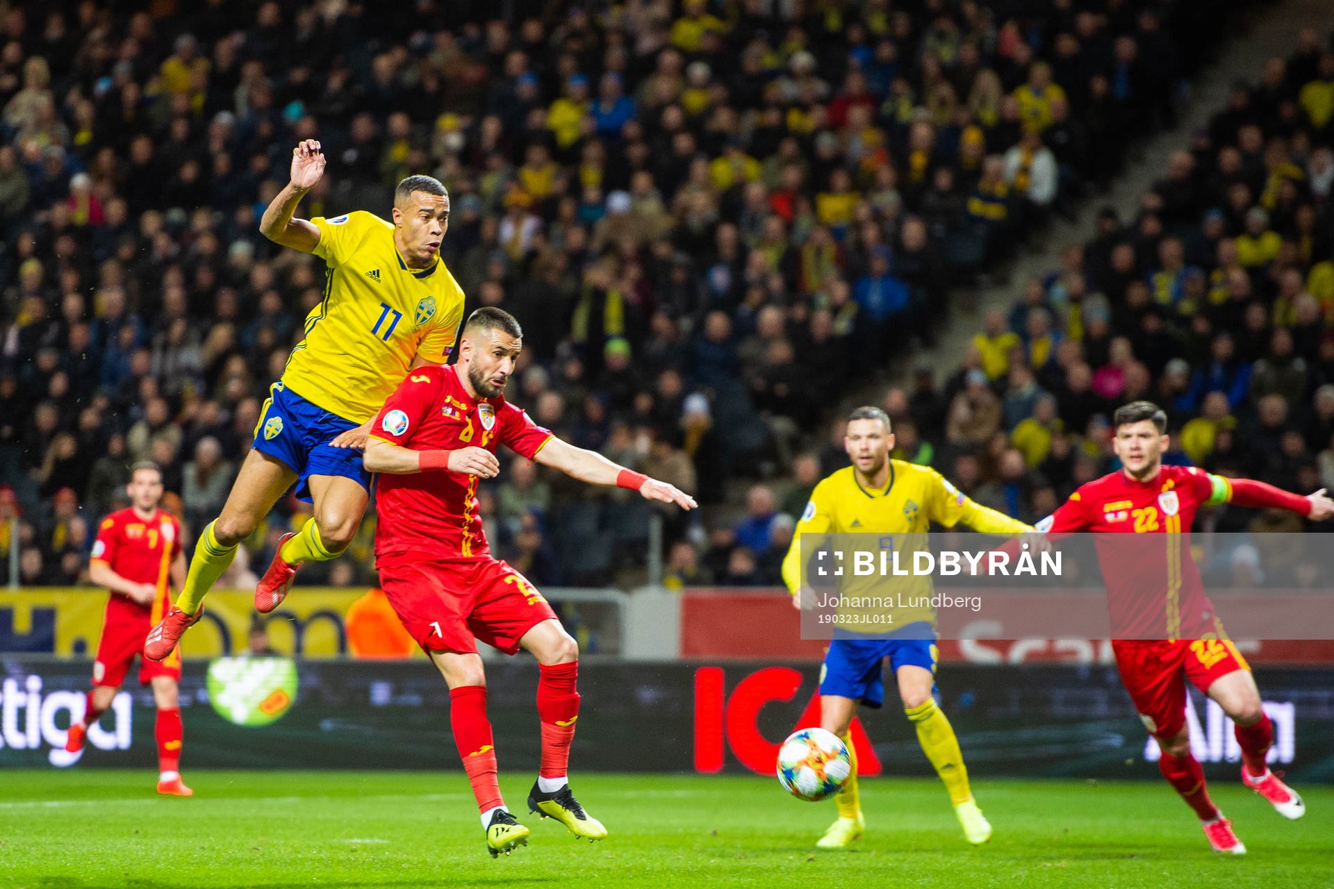 Robin Quaison of Sweden and Dragos Grigore of Romania