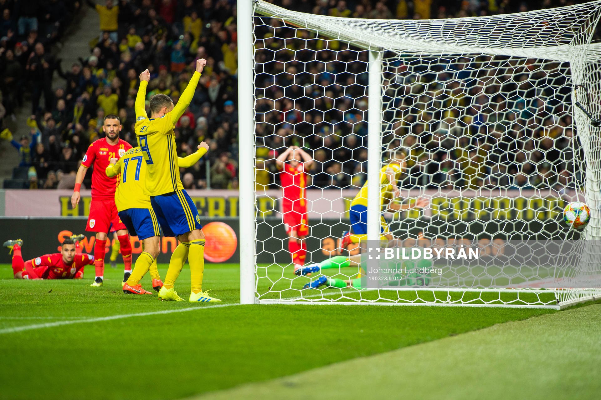 Viktor Claesson and Marcus Berg celebrate