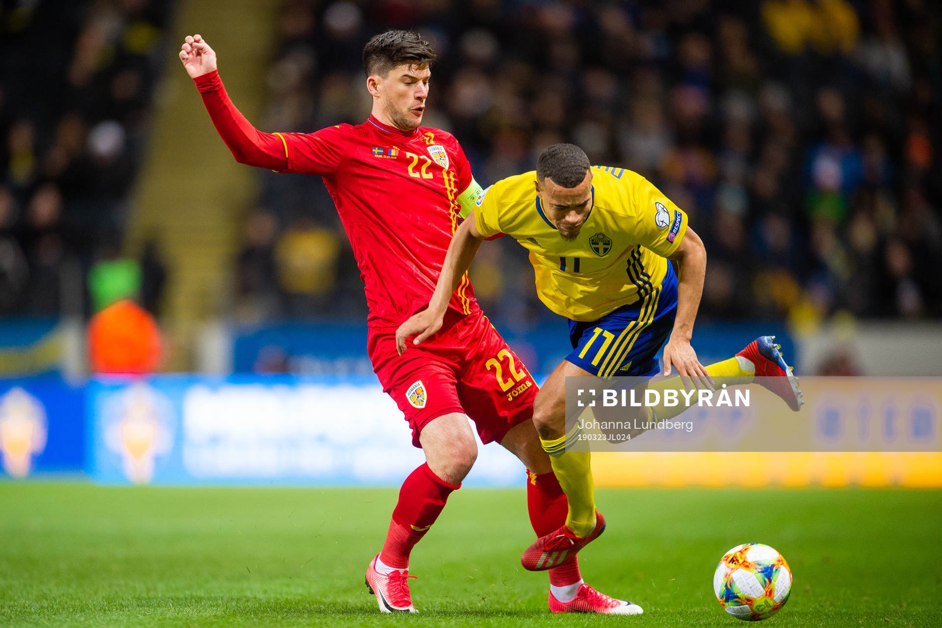 Cristian Sapunaru of Romania and Robin Quaison of Sweden