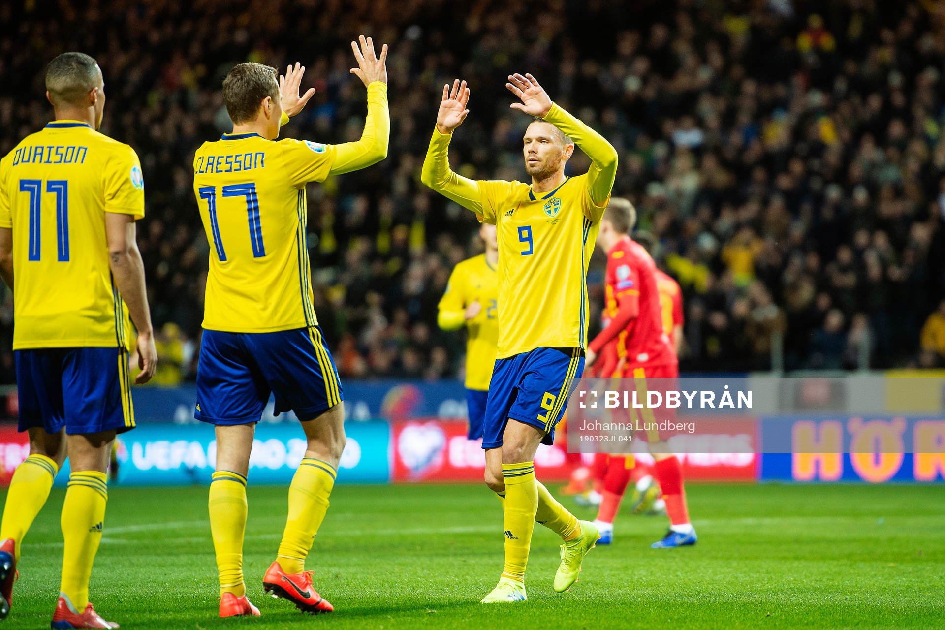 Robin Quaison, Viktor Claesson and of Sweden celebrates