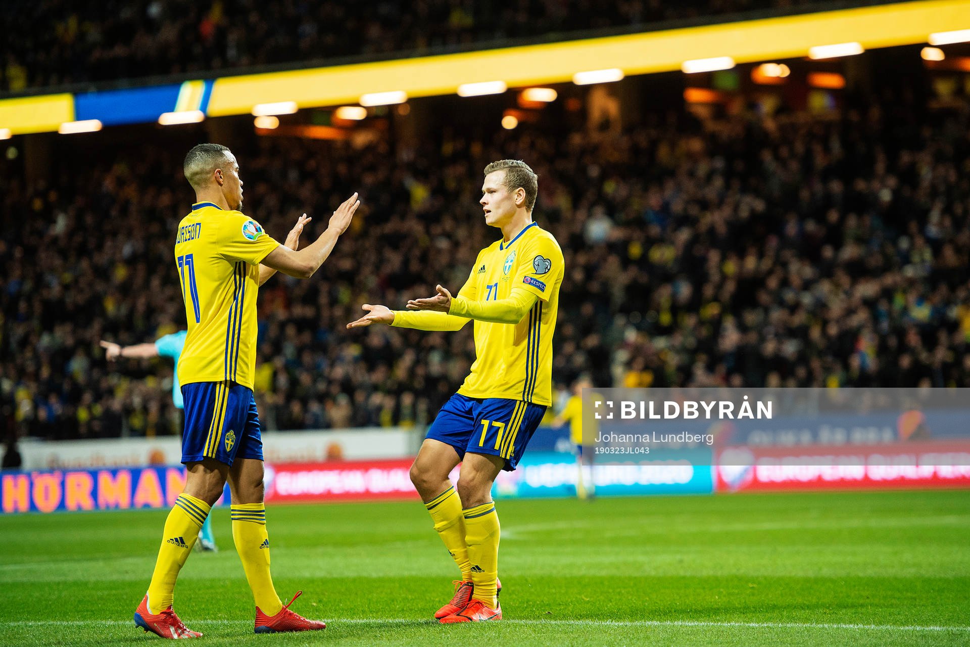 Robin Quaison and Viktor Claesson of Sweden  celebrates