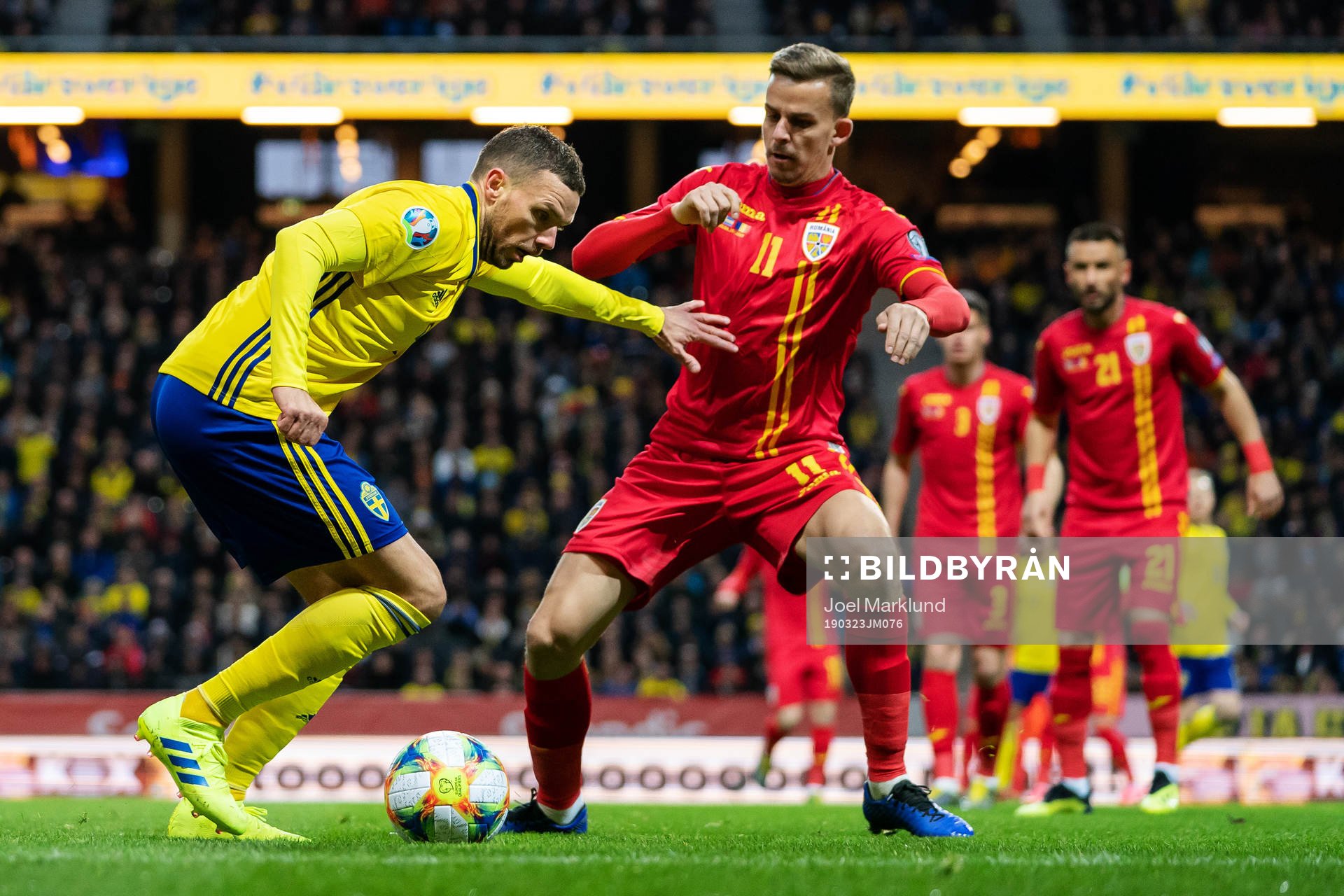 Marcus Berg and Nicusor Bancu of Romania