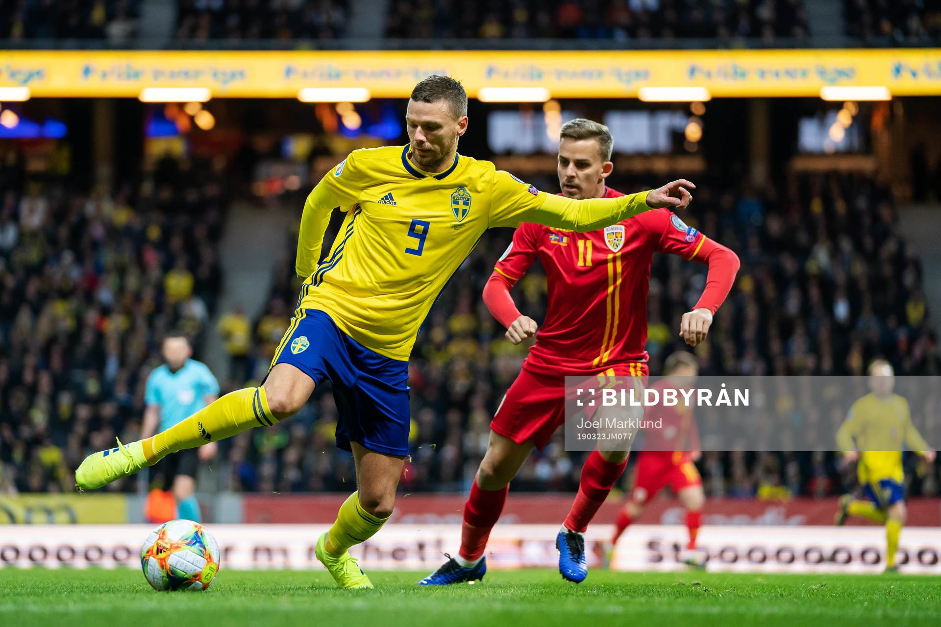 Marcus Berg and Nicusor Bancu of Romania