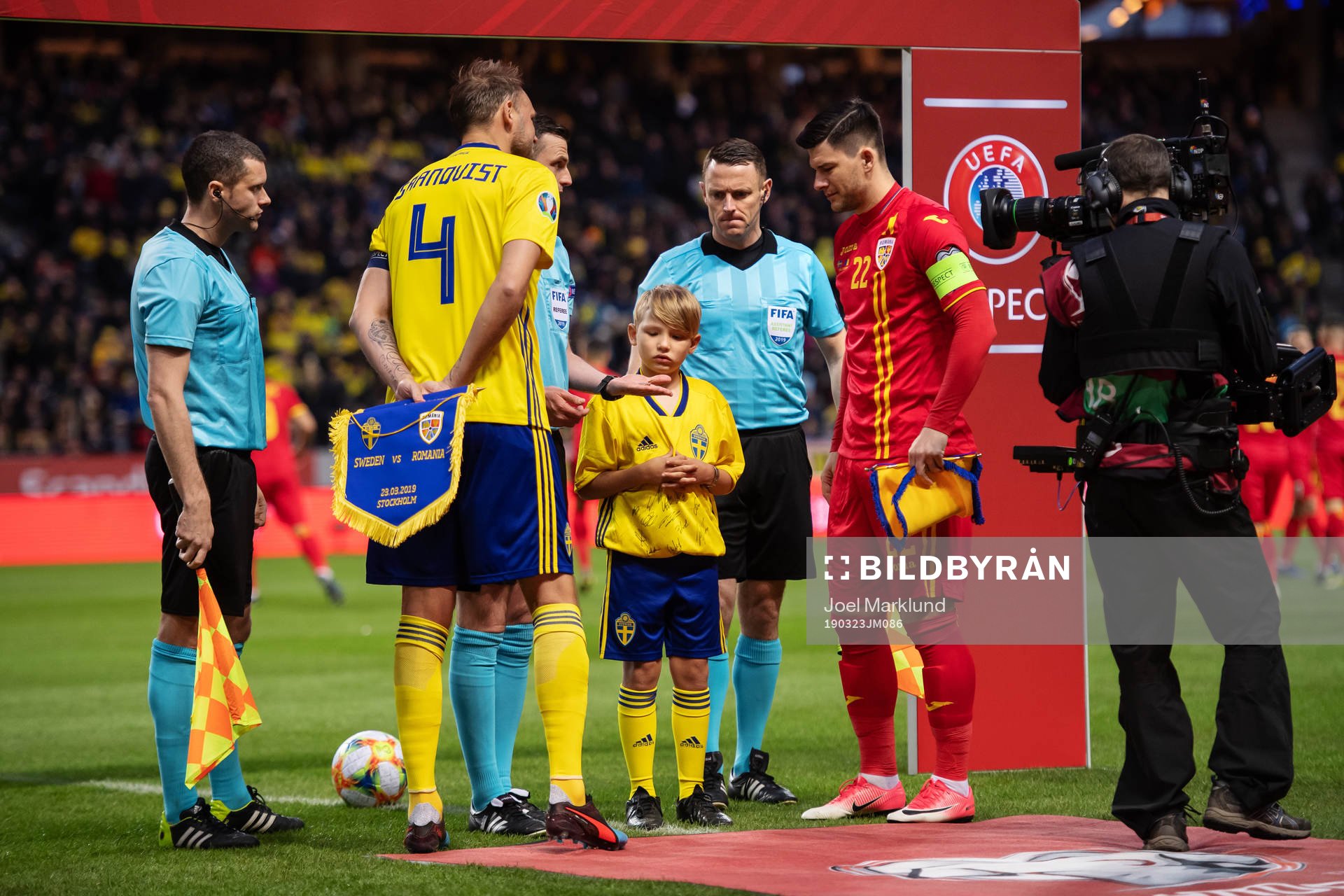 Andreas Granqvist of Sweden, Oscar Petersson from Min stora dag and Cristian Sapunaru of Romania ahead of the UEFA Euro Qualifier football match between Sweden and Romania on March 23, 2019 in Stockholm.