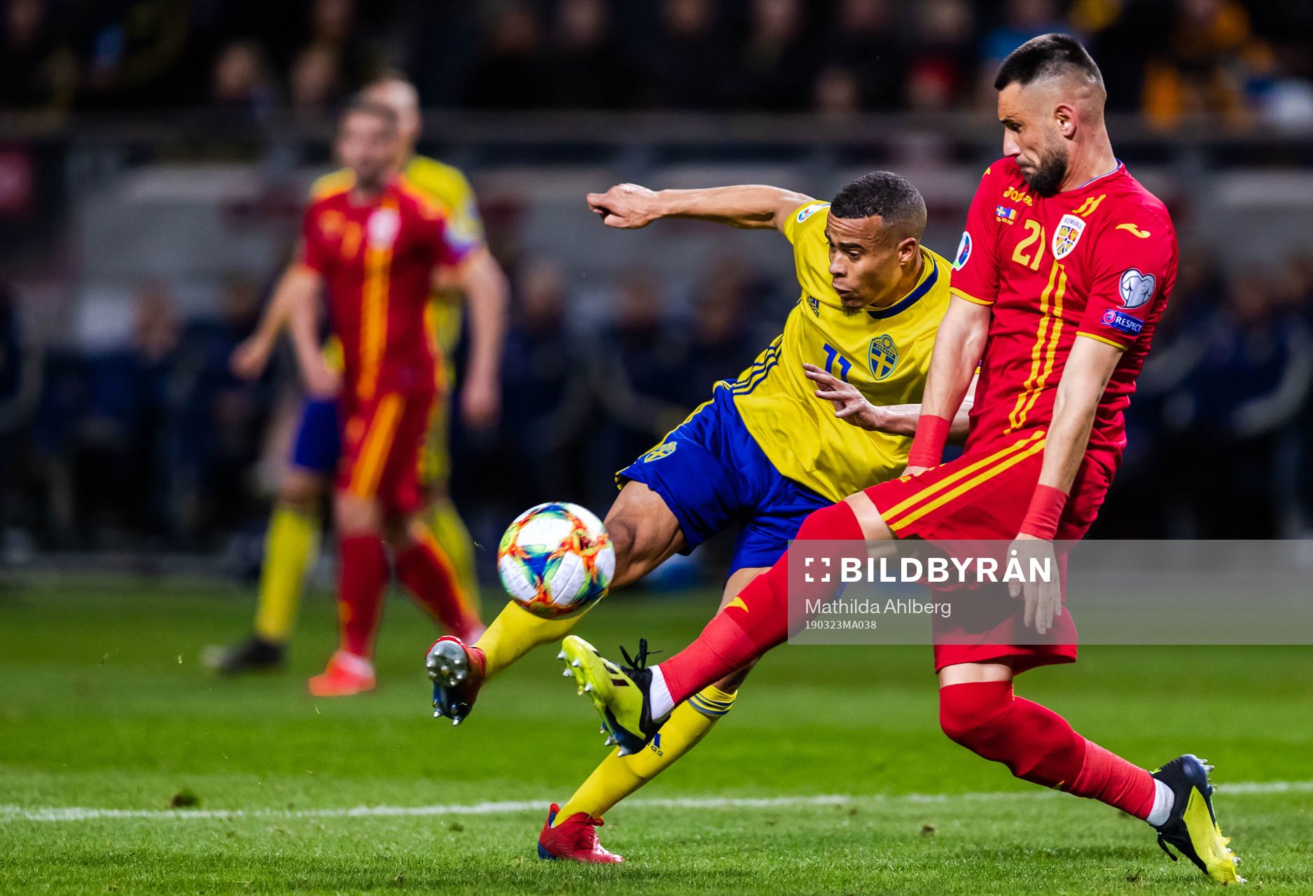 Robin Quaison of Sweden and Dragos Grigore of Romania