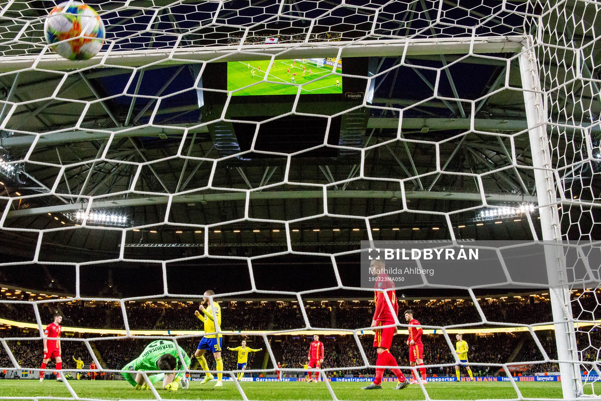 Players of Romania looks dejected