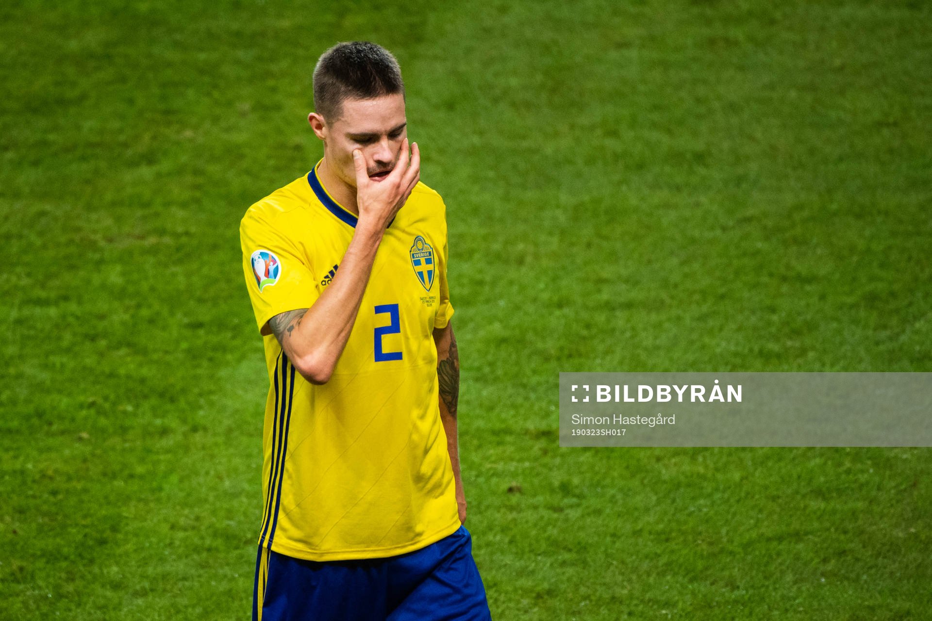 of Sweden Mikael Lustig looks dejected as he leaves the