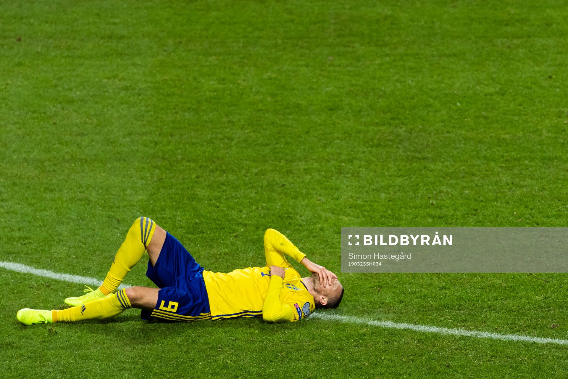 Marcus Berg of Sweden lies down