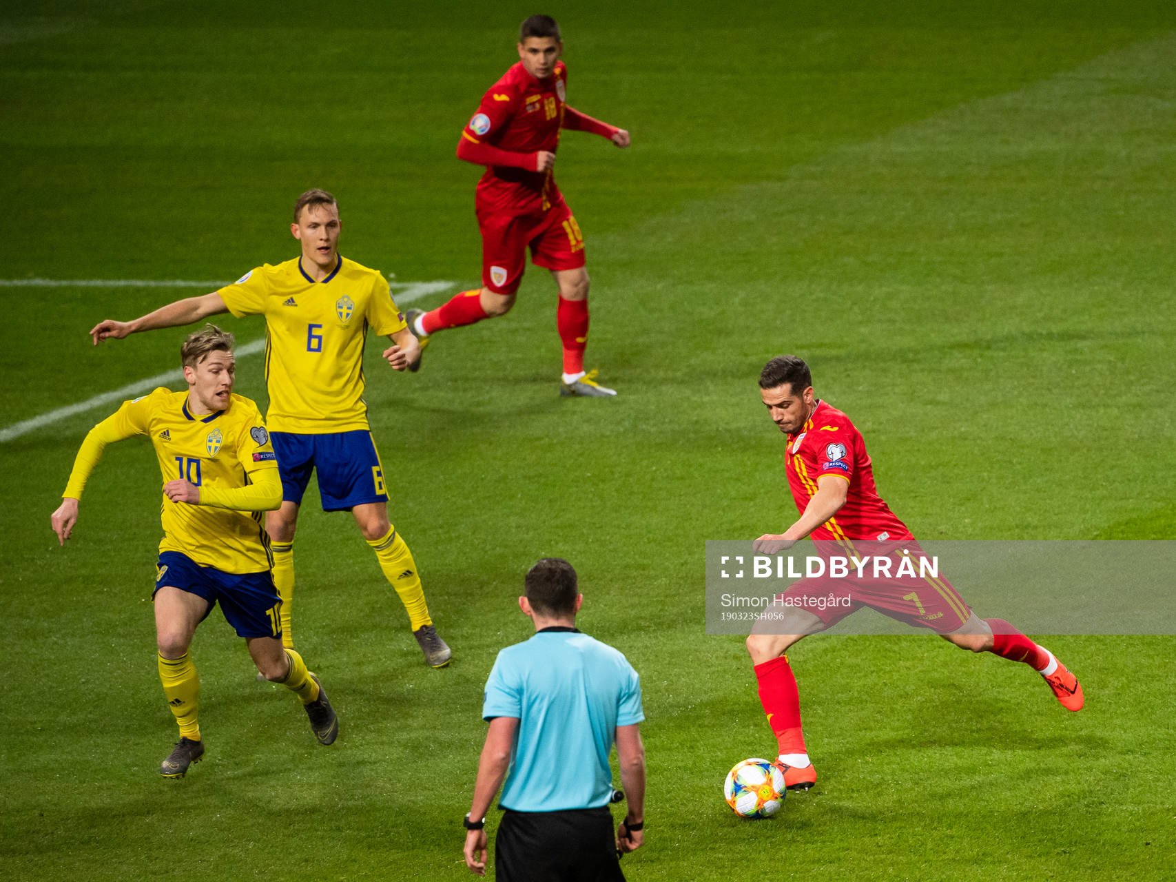 Alexandru Chipciu of Romania challenges Emil Forsberg and