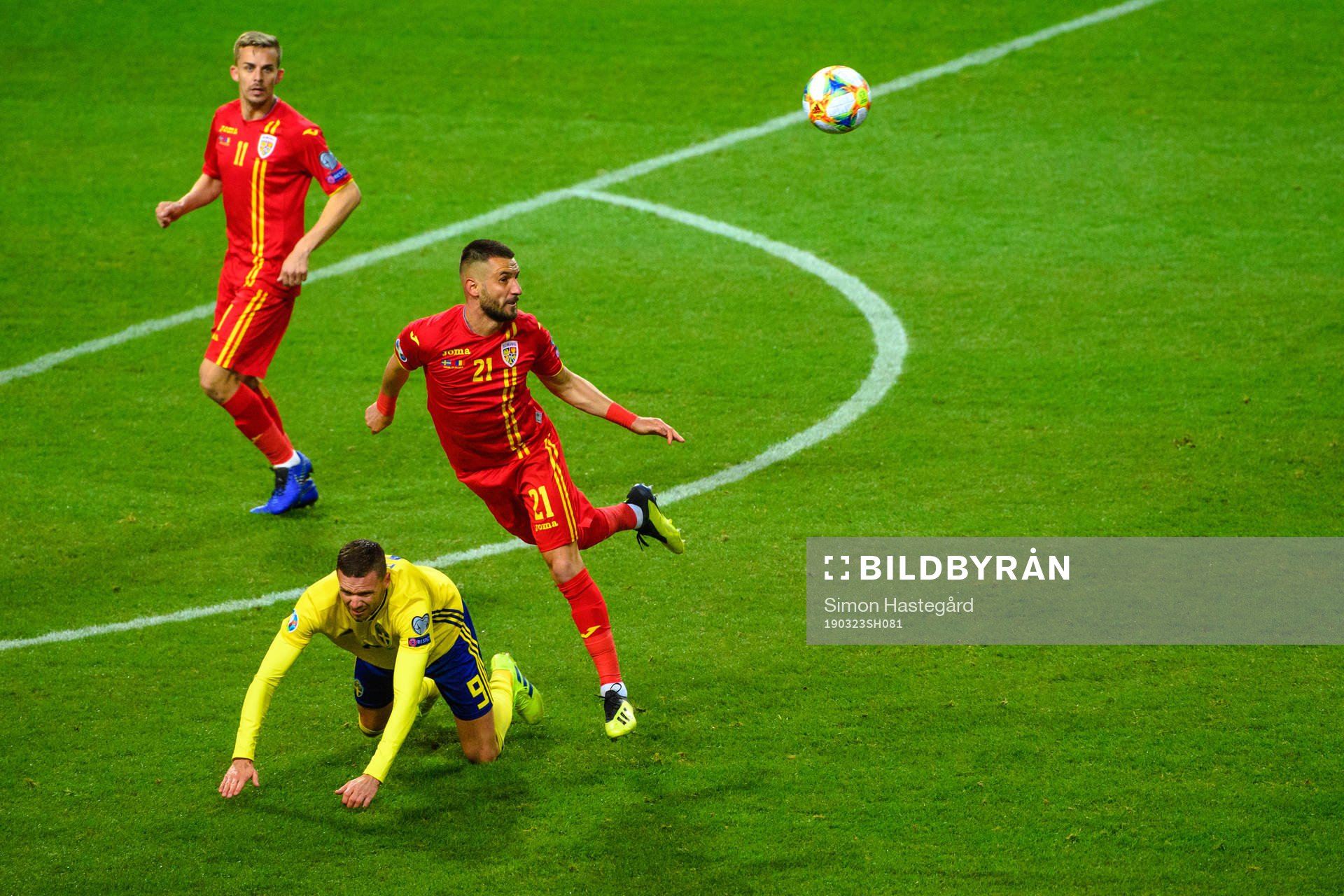 Marcus Berg of Sweden and Dragos Grigore of Romania