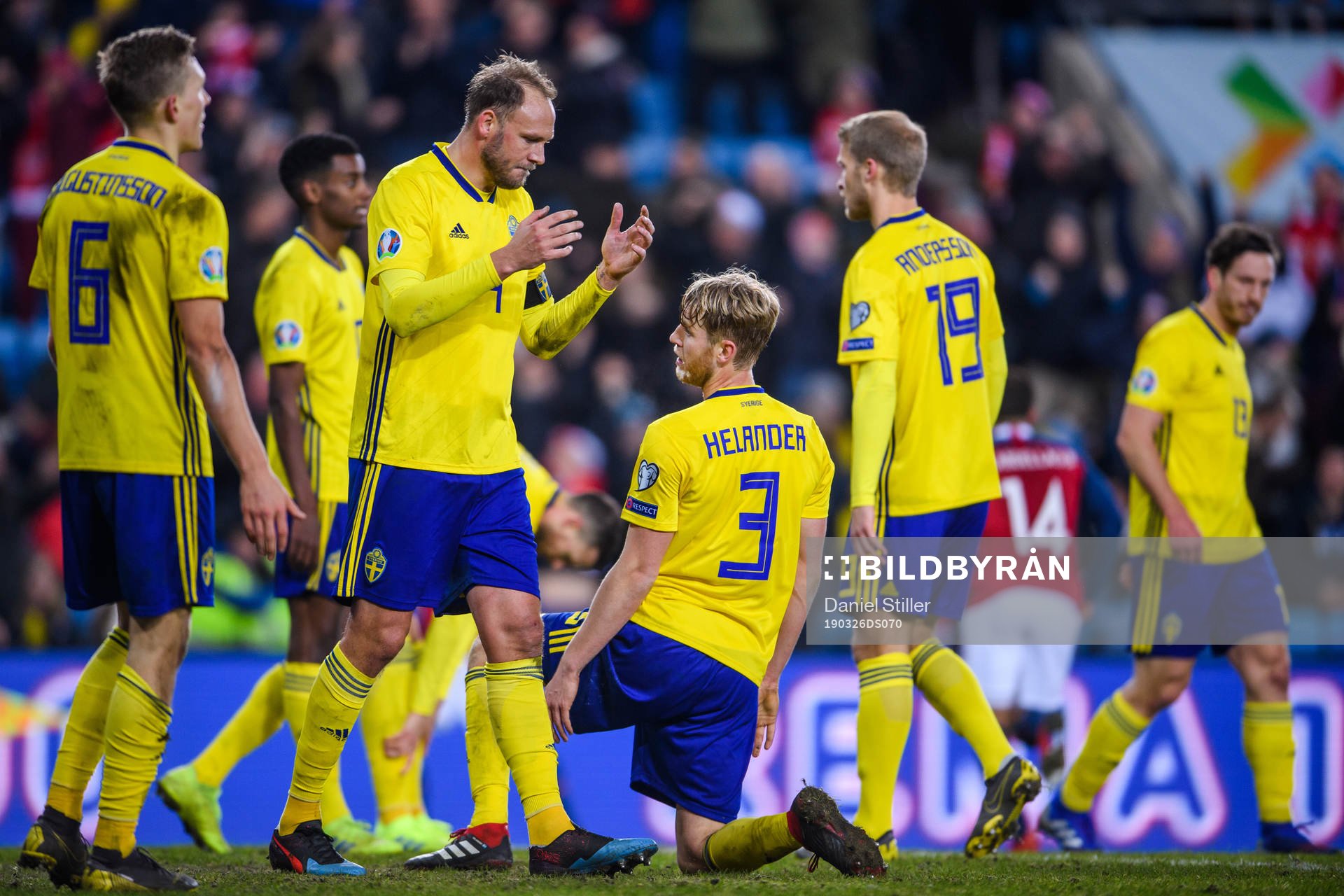 Andreas Granqvist and Filip Helander of Sweden looks