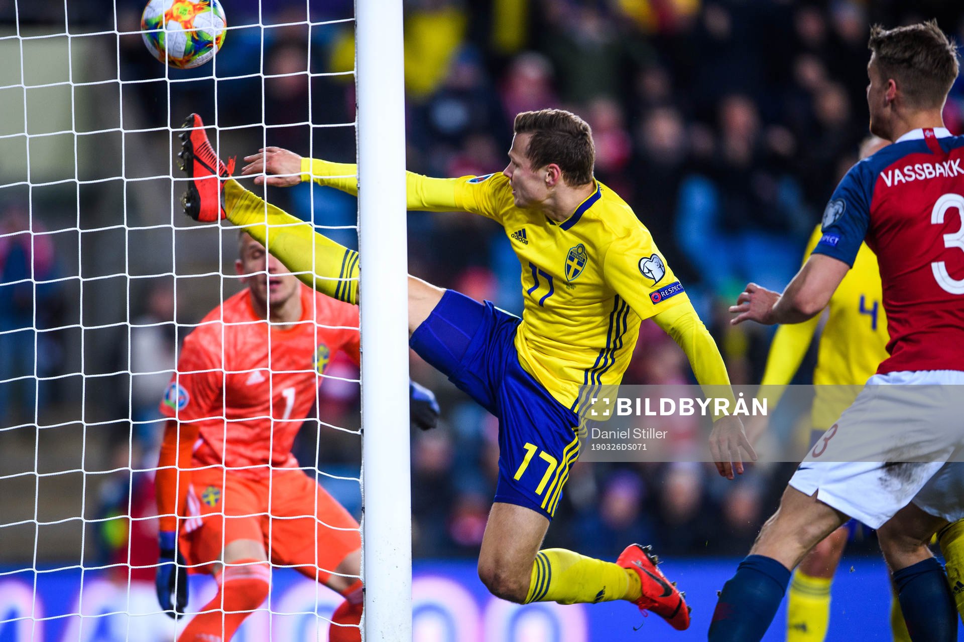 Viktor Claesson of Sweden tries to save when Ola Kamara of