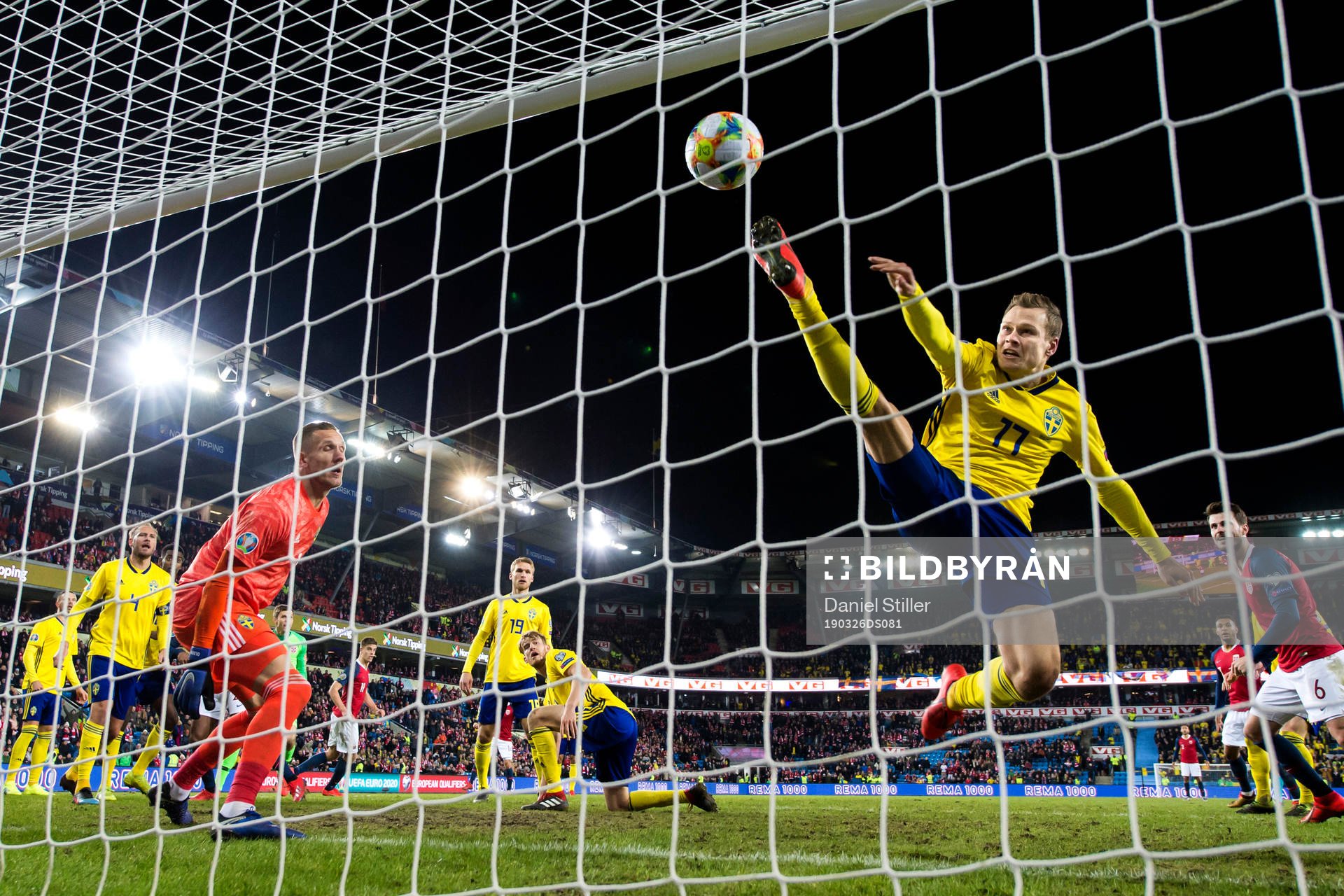 Viktor Claesson of Sweden tries to save when Ola Kamara of