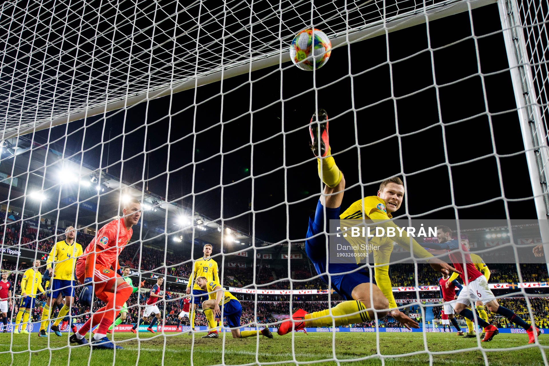 Viktor Claesson of Sweden tries to save when Ola Kamara of
