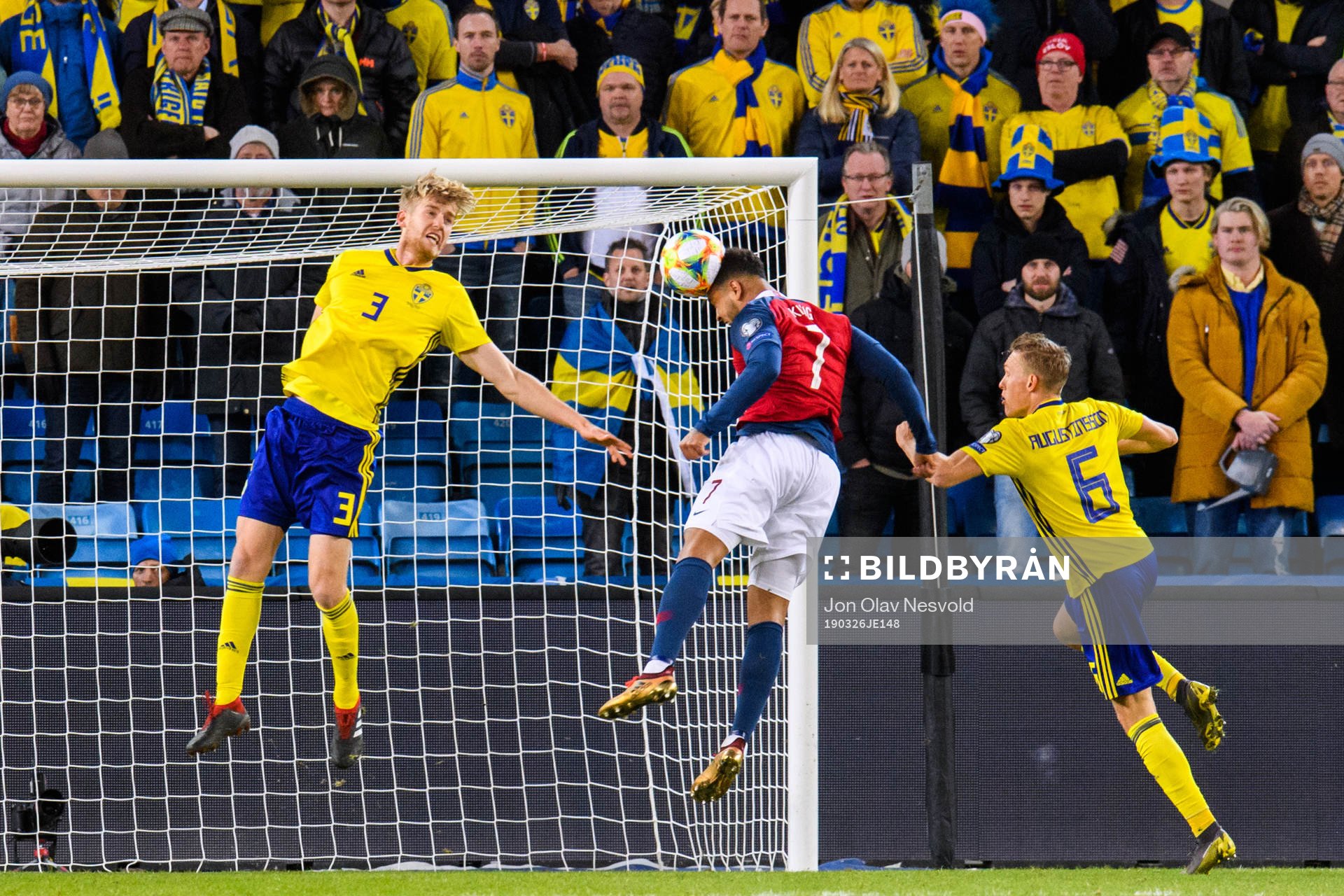 Joshua King of Norway in action with Filip Helander and