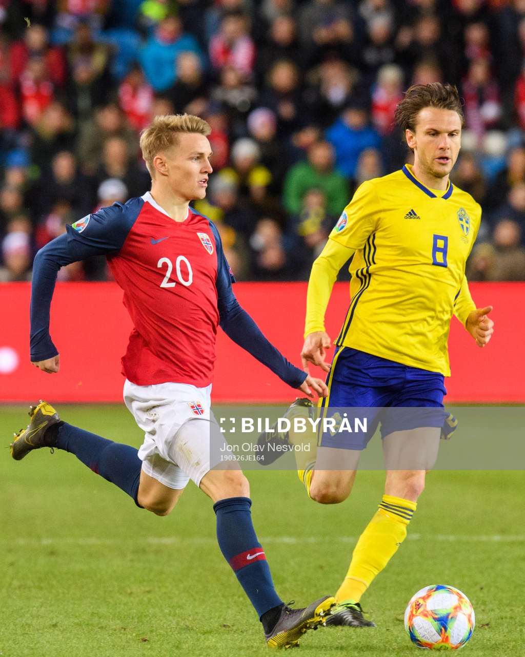 Martin Ødegaard of Norway and Albin Ekdal of Sweden